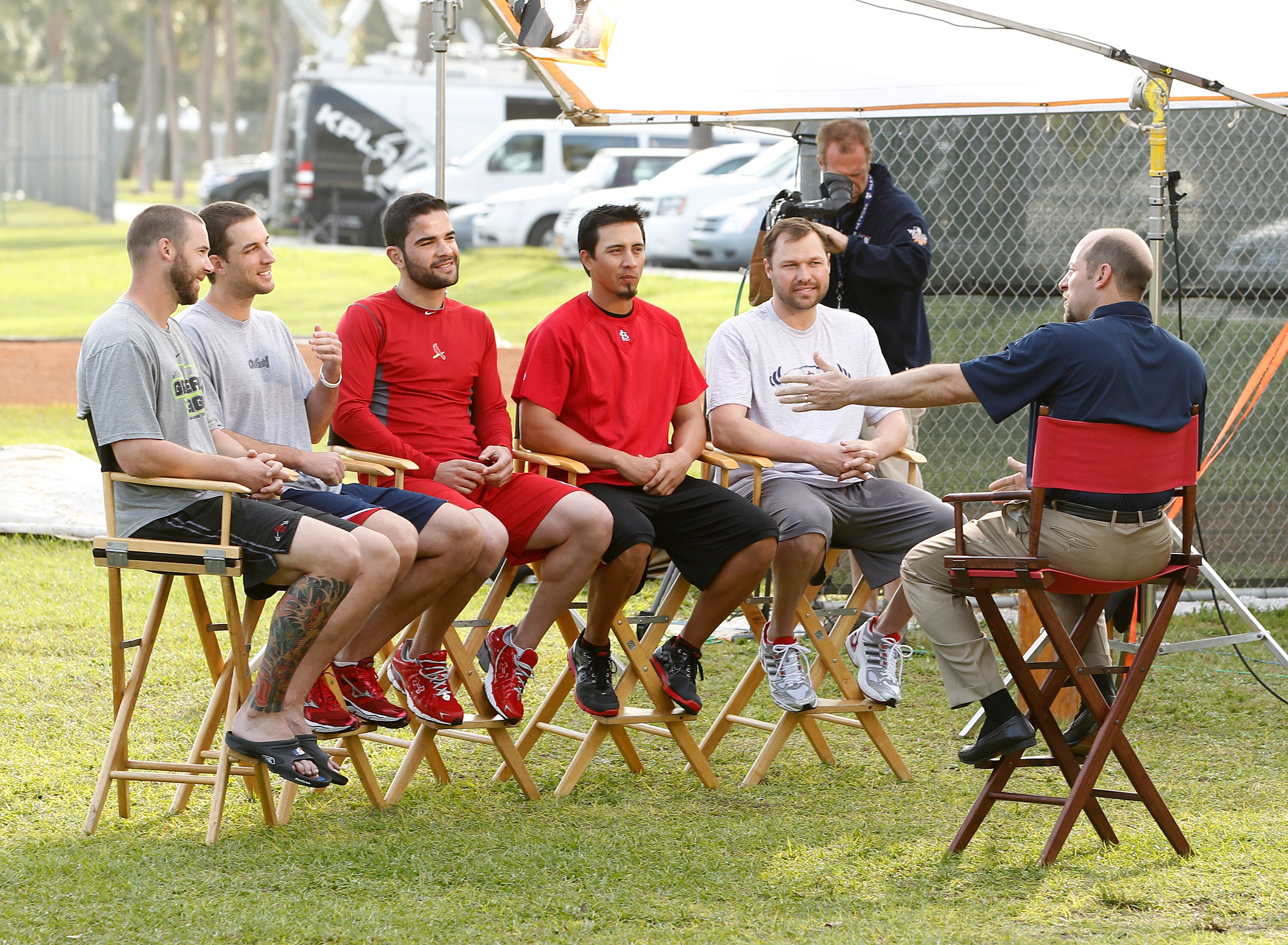 JUPITER, FL - FEBRUARY 17: Former MLB pitcher John Smoltz interviews (L-R) Chris Carpenter #29, Adam Wainwright #50, Jaime Garcia #54, Kyle Lohse #26, and Jake Westbrook #35 of the St. Louis Cardinals at Roger Dean Stadium on February 17, 2011 in Jupiter,