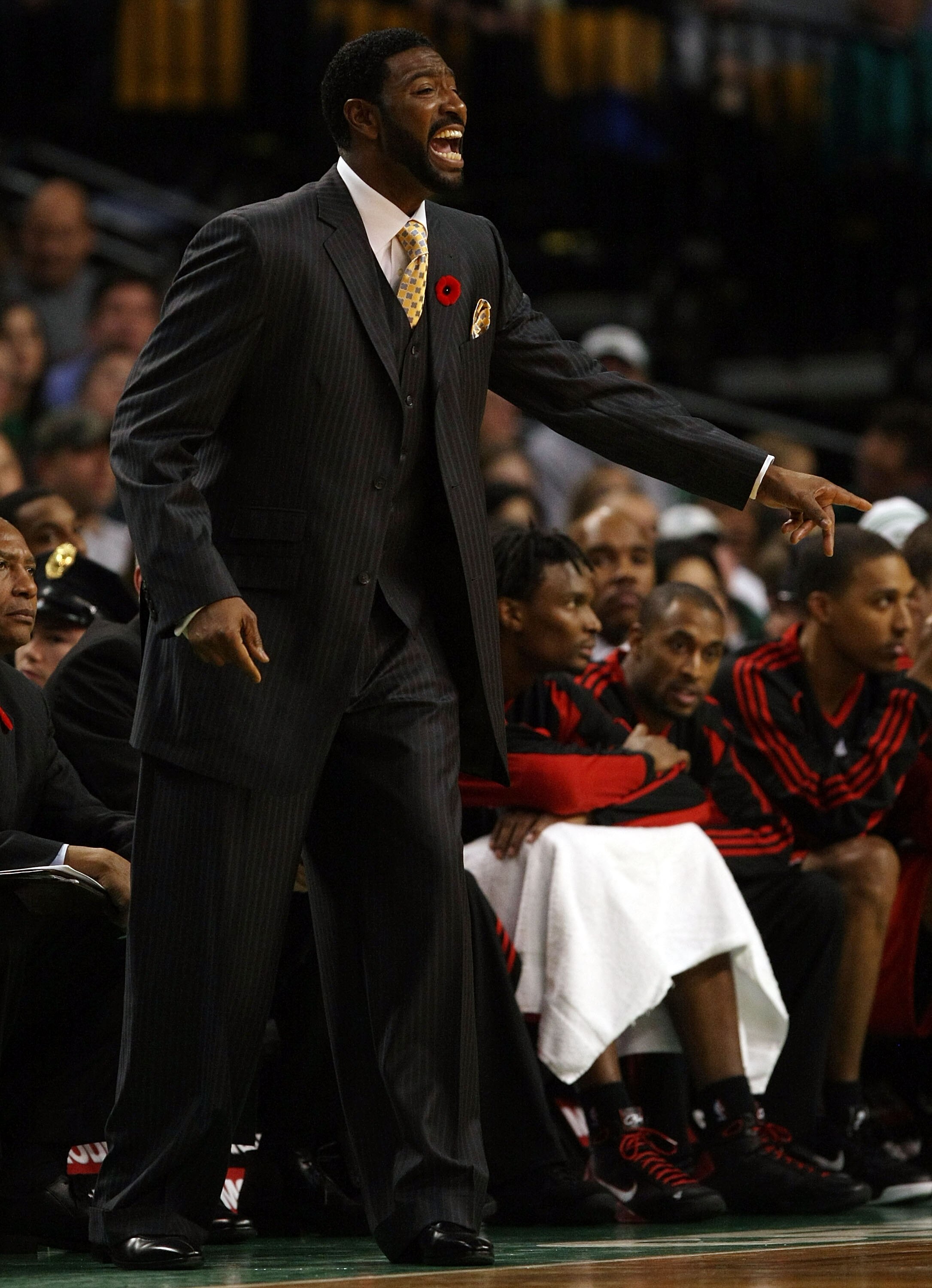 BOSTON - NOVEMBER 10:  Head coach Sam Mitchell of the Toronto Raptors reacts to a foul called on one of his players in the fourth quarter against the Boston Celtics on November 10,  2008 at TD Banknorth Garden in Boston, Massachusetts. The Celtics defeate