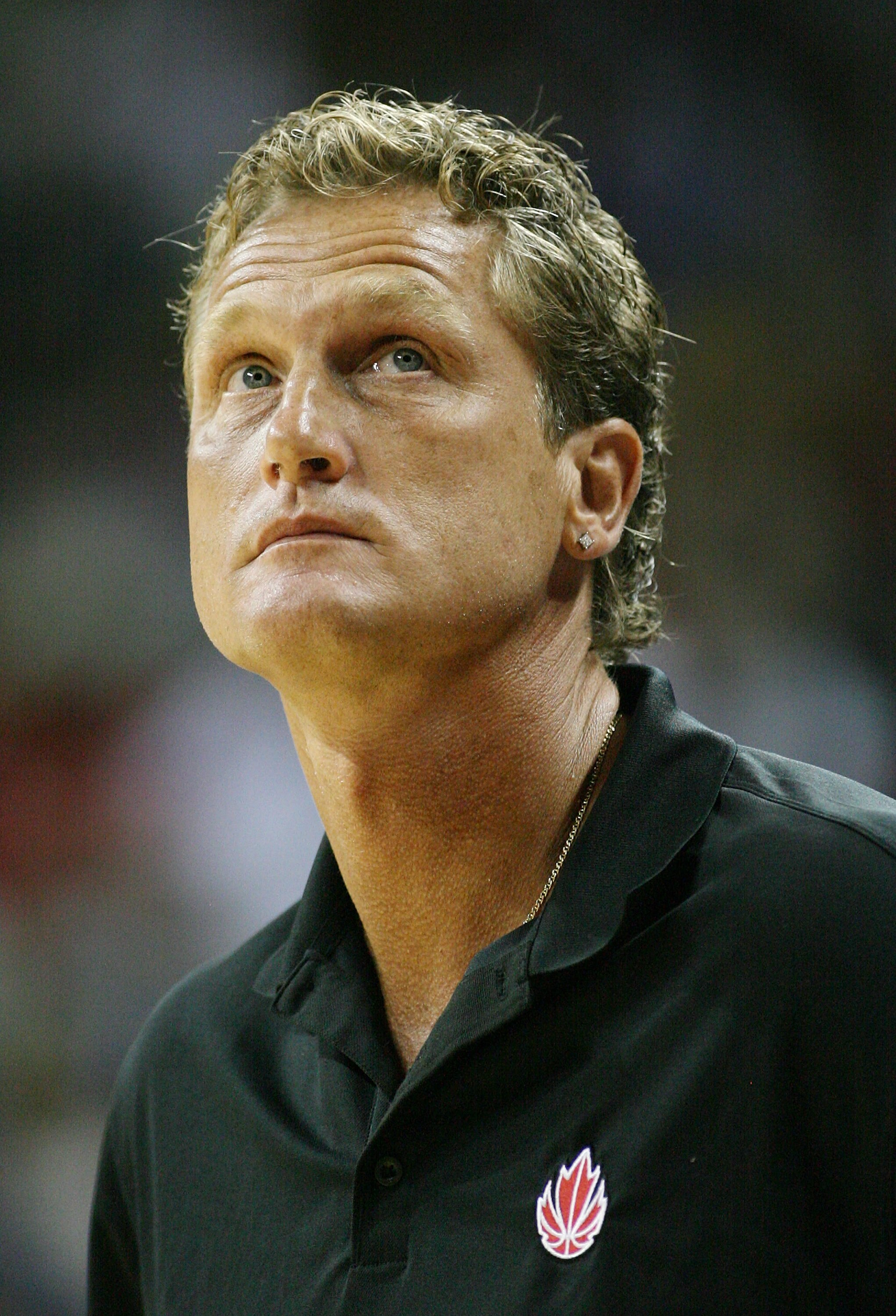 LAS VEGAS - JULY 25:  Head coach Leo Rautins of the Canadian Senior Men's National Team checks the scoreboard during the 2008 State Farm Basketball Challenge exhibition game against the USA Basketball Men's Senior National Team at the Thomas & Mack Center