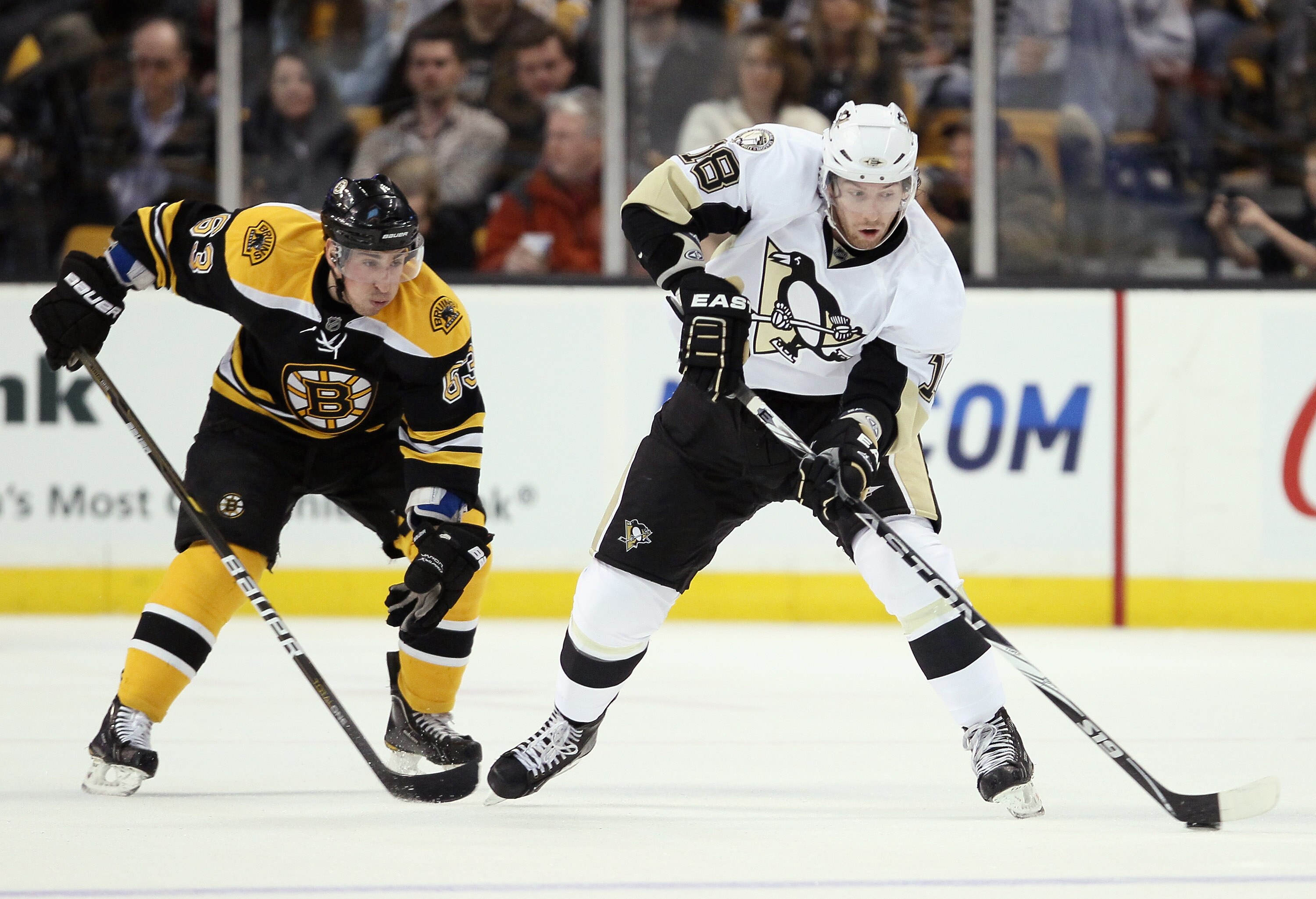 BOSTON, MA - MARCH 05: James Neal #18 of the Pittsburgh Penguins takes the puck as Brad Marchand #63 of the Boston Bruins defends on March 5, 2011 at the TD Garden in Boston, Massachusetts. (Photo by Elsa/Getty Images) BOSTON, MA - MARCH 05: James Neal #18 of the Pittsburgh Penguins takes the puck as Brad Marchand #63 of the Boston Bruins defends on March 5, 2011 at the TD Garden in Boston, Massachusetts. (Photo by Elsa/Getty Images)