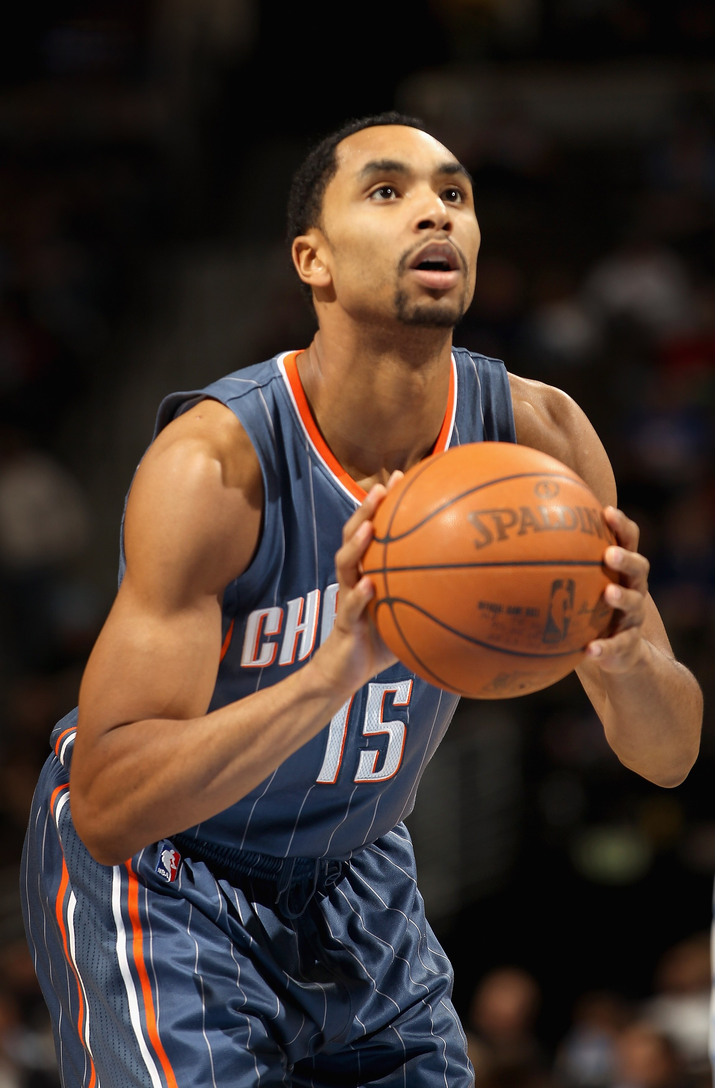 DENVER, CO - MARCH 02:  Gerald Henderson #15 of the Charlotte Bobcats takes a free throw against the Denver Nuggets at the Pepsi Center on March 2, 2011 in Denver, Colorado. The Nuggets defeated the Bobcats 120-80.NOTE TO USER: User expressly acknowledges