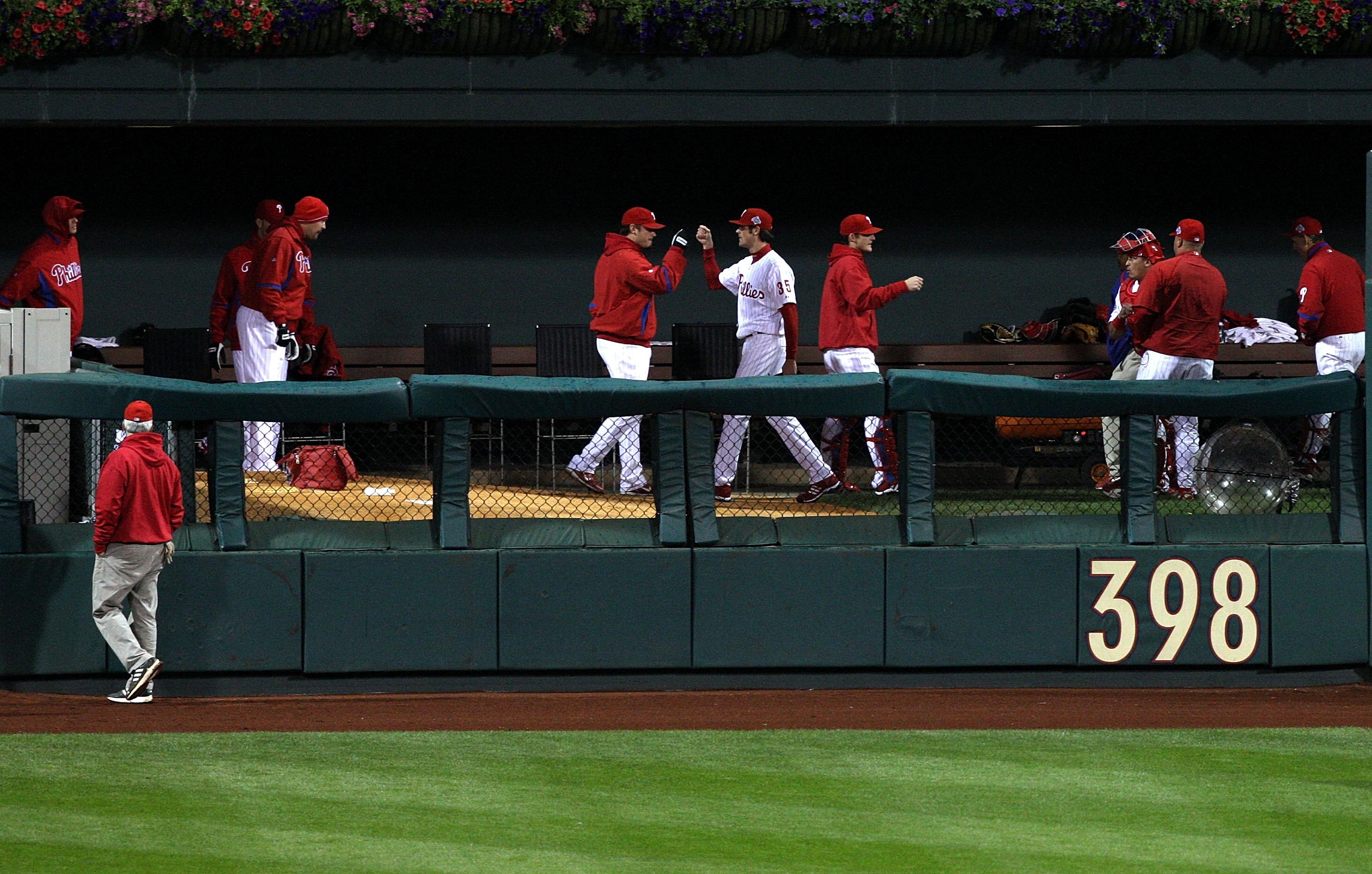 PHILADELPHIA - OCTOBER 27:  Starting pitcher Cole Hamels #35 of the Philadelphia Phillies greets his teammates in the bullpen before walking out to pitch against the Tampa Bay Rays during game five of the 2008 MLB World Series on October 27, 2008 at Citiz