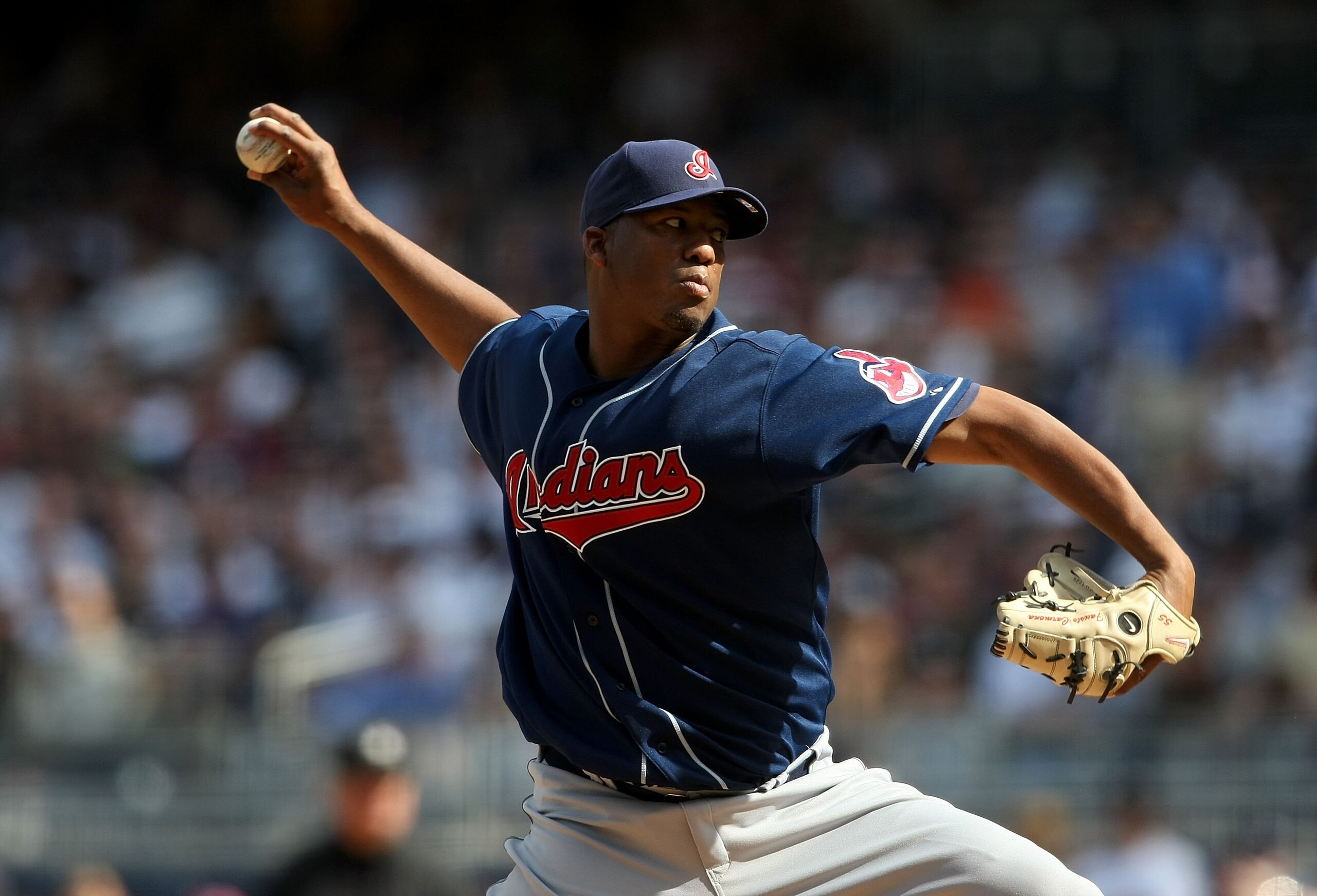 NEW YORK - APRIL 18:  Fausto Carmona #55 of the Cleveland Indians pitches against the New York Yankees at Yankee Stadium on April 18, 2009 in the Bronx borough of New York City.  (Photo by Nick Laham/Getty Images)