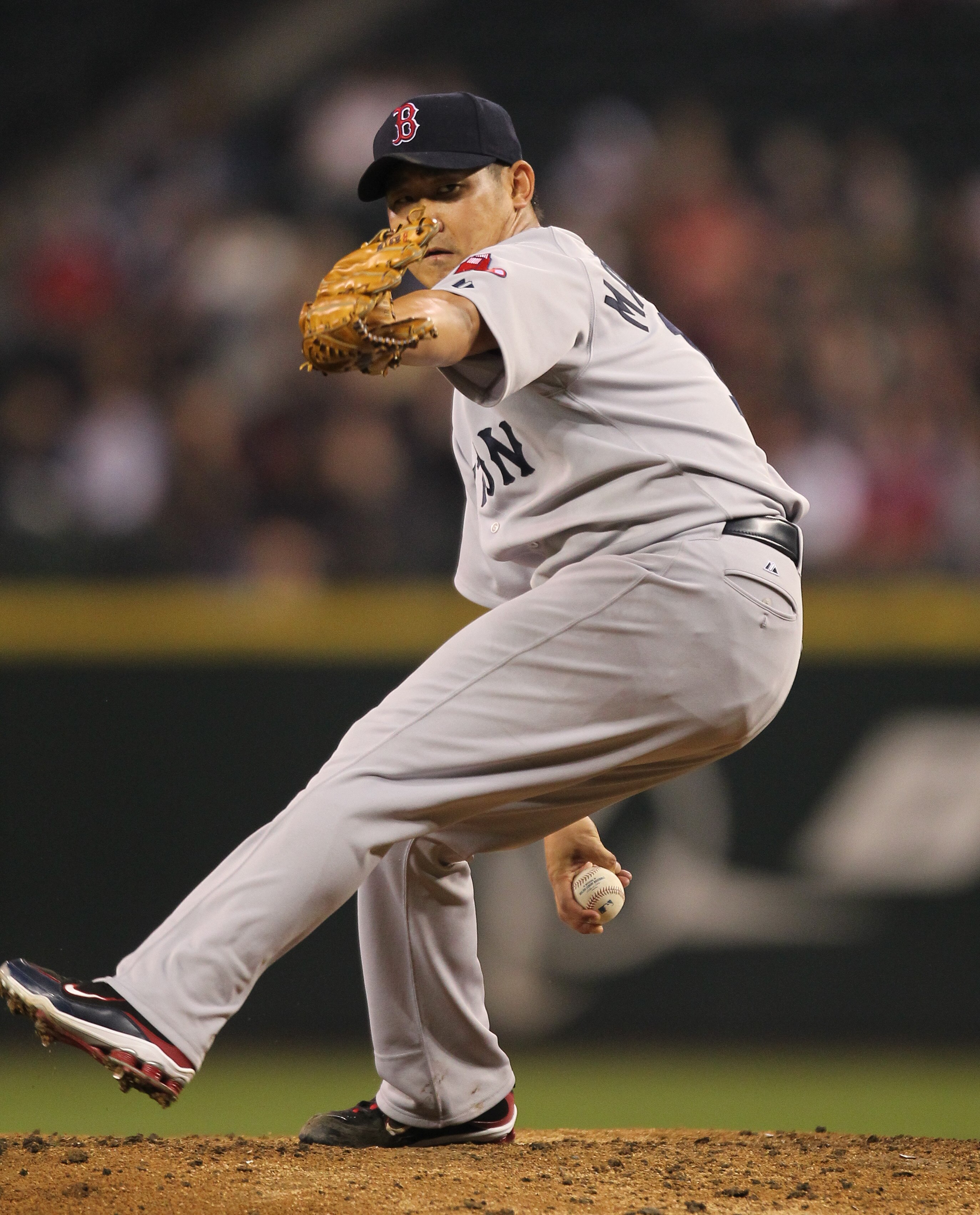 SEATTLE - SEPTEMBER 14:  Starting pitcher Daisuke Matsuzaka #18 of the Boston Red Sox pitches against the Seattle Mariners at Safeco Field on September 14, 2010 in Seattle, Washington. The Red Sox won 9-6. (Photo by Otto Greule Jr/Getty Images)