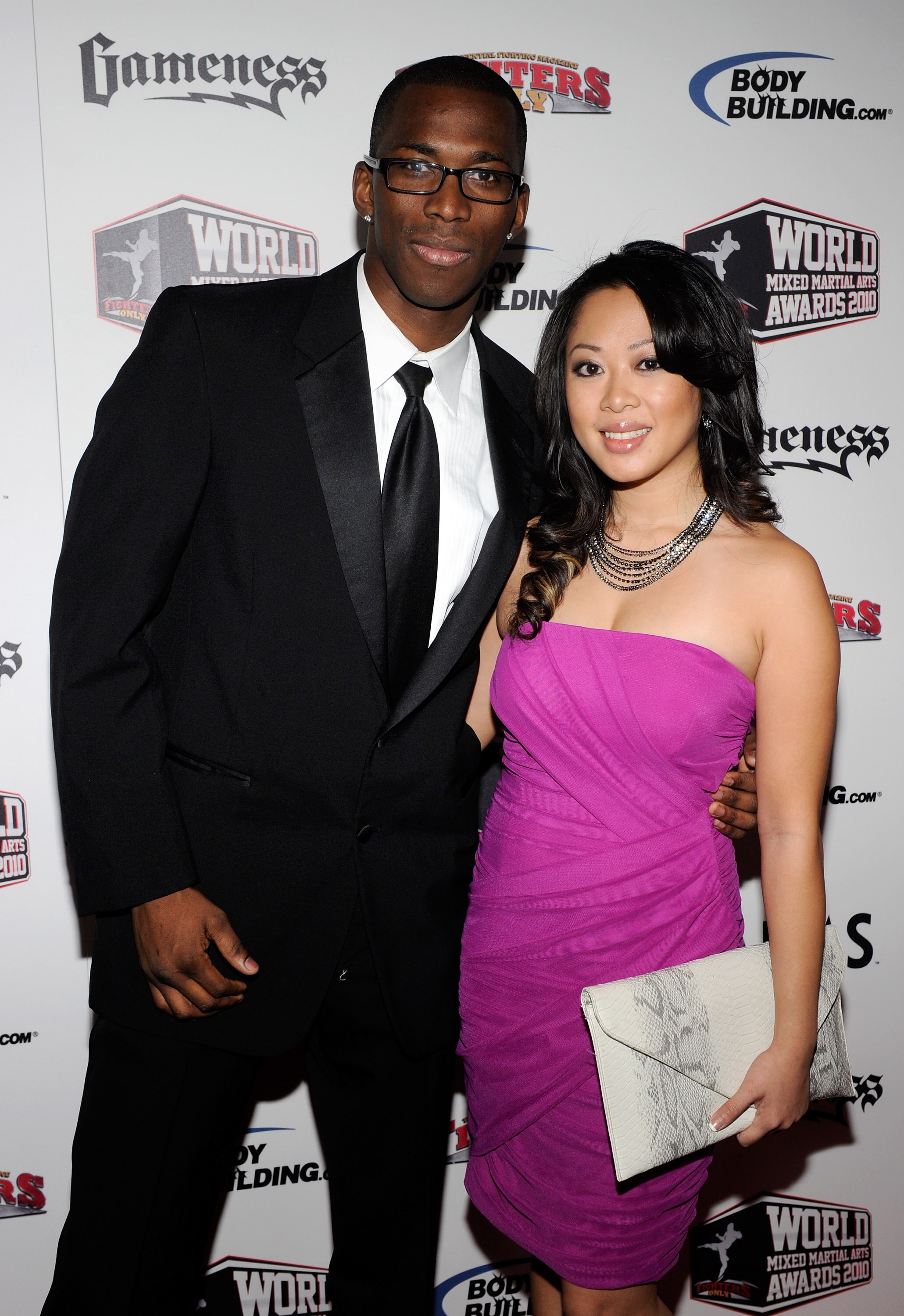 LAS VEGAS, NV - DECEMBER 01:  Mixed martial artist Anthony Njokuani (L) and Cindy Nguyen arrive at the third annual Fighters Only World Mixed Martial Arts Awards 2010 at the Palms Casino Resort December 1, 2010 in Las Vegas, Nevada.  (Photo by Ethan Mille