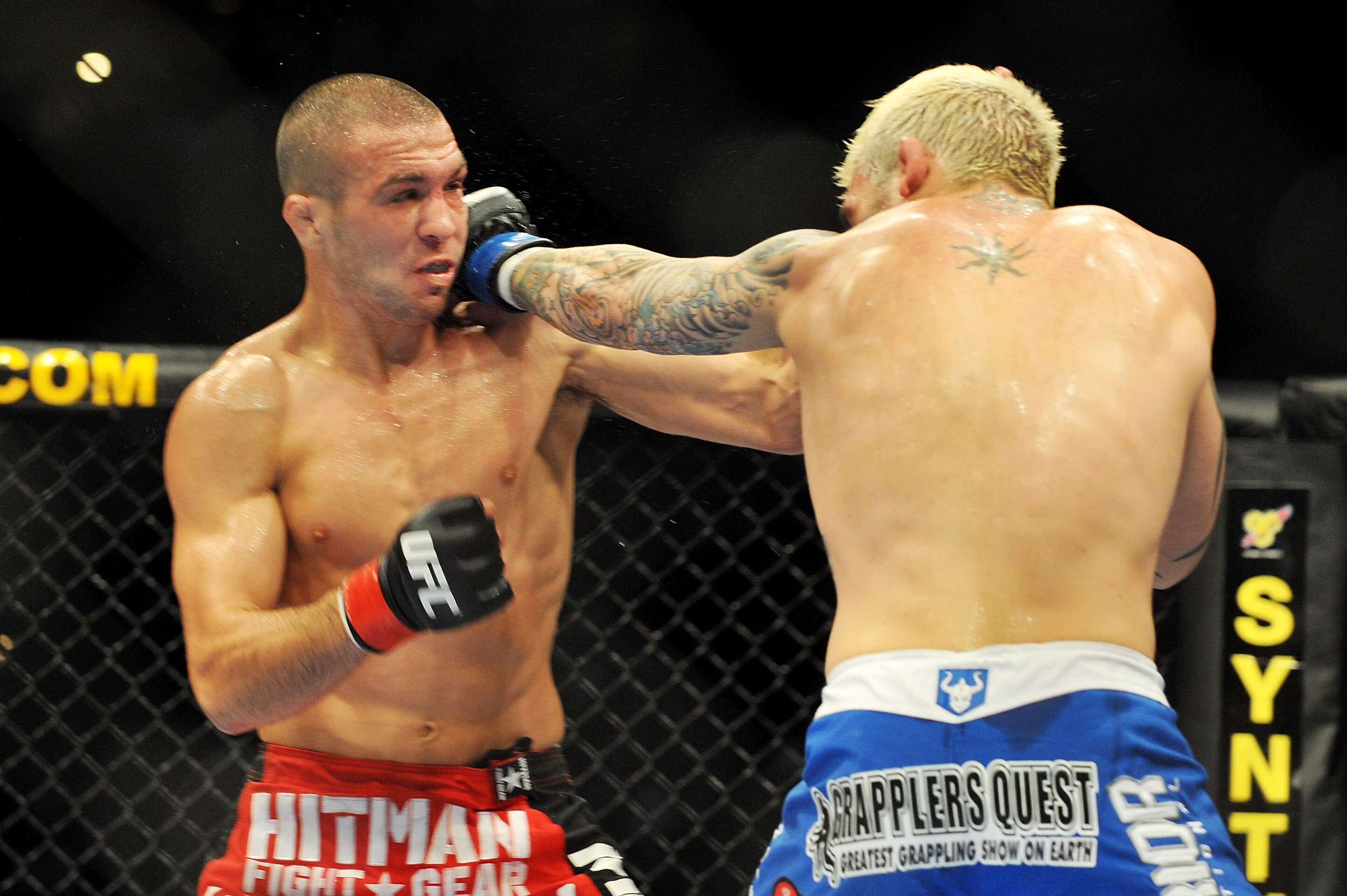 PHILADELPHIA - AUGUST 08:  (L-R) Josh Neer battles Kurt Pellegrino during their lightweight bout at UFC 101: Declaration at the Wachovia Center on August 8, 2009 in Philadelphia, Pennsylvania.  (Photo by Jon Kopaloff/Getty Images)