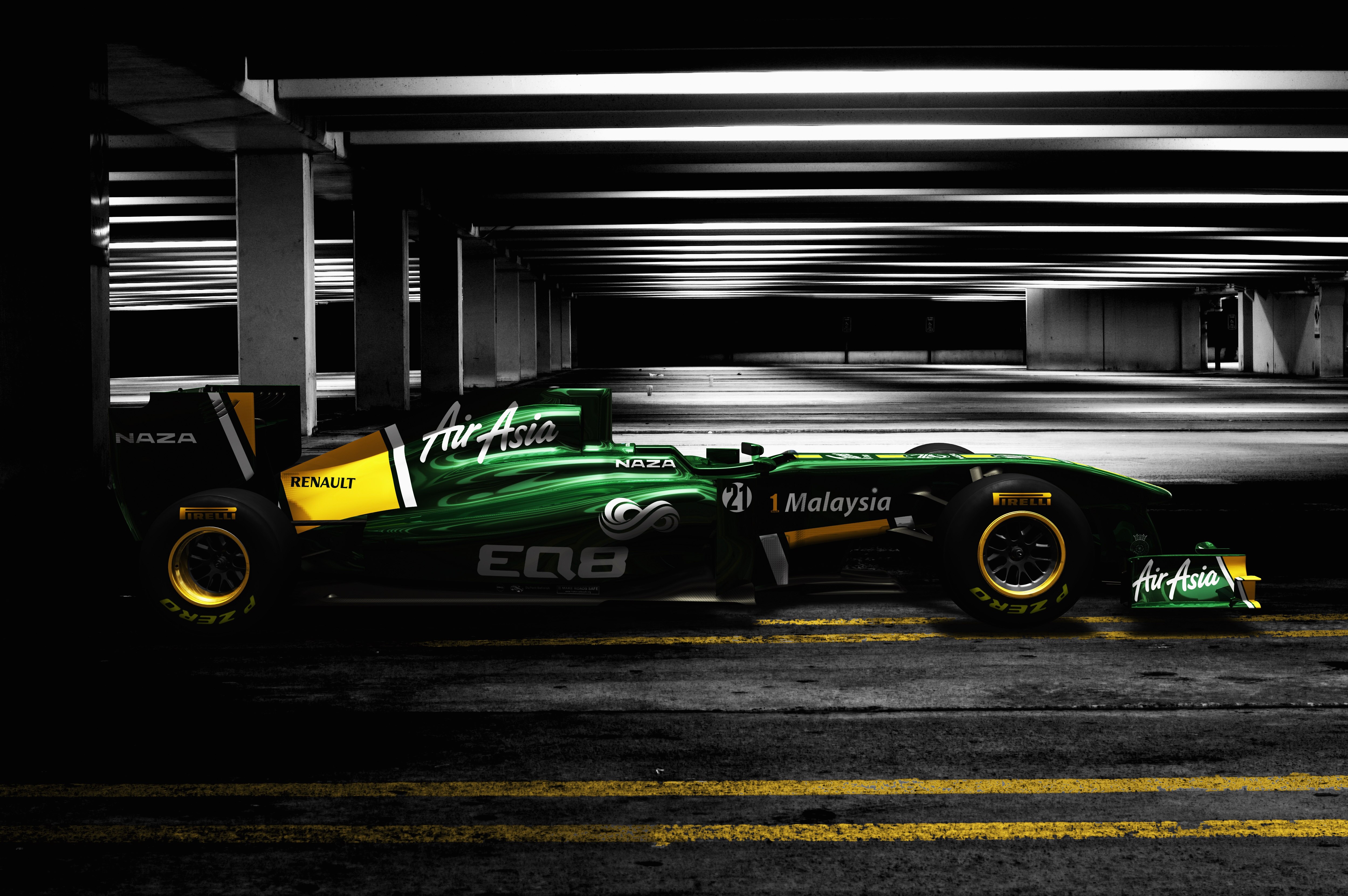 NORFOLK, UNITED KINGDOM - UNDATED:  In this handout from Lotus, made available on January 31, 2011, Team Lotus unveil the new T128  in Norfolk, England.  (Photo by Lotus via Getty Images)