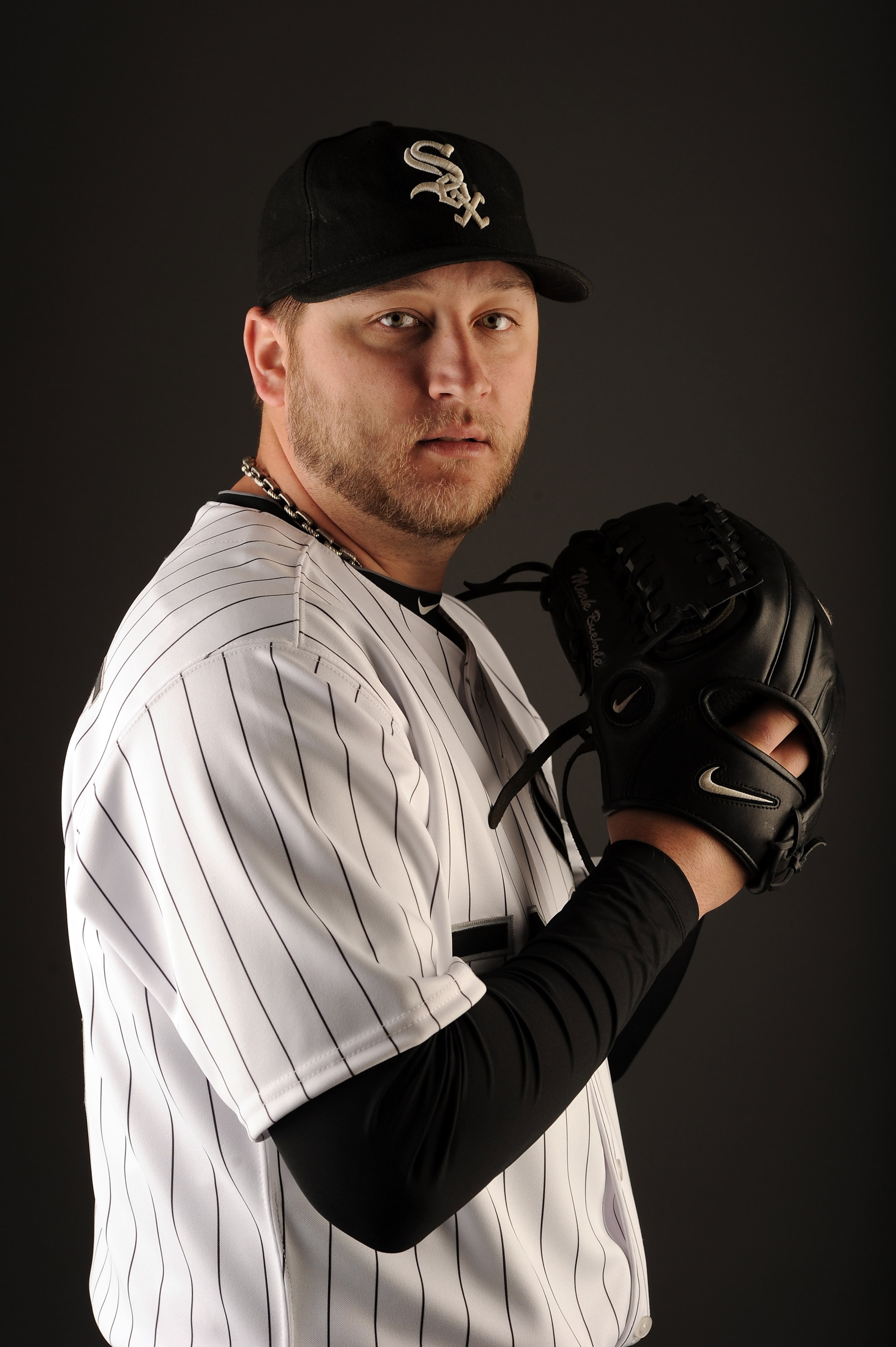GLENDALE, AZ - FEBRUARY 26:  Mark Buehrle #56 of the Chicago White Sox poses for a photo on photo day at Camelback Ranch on February 26, 2011 in Glendale, Arizona.  (Photo by Harry How/Getty Images)