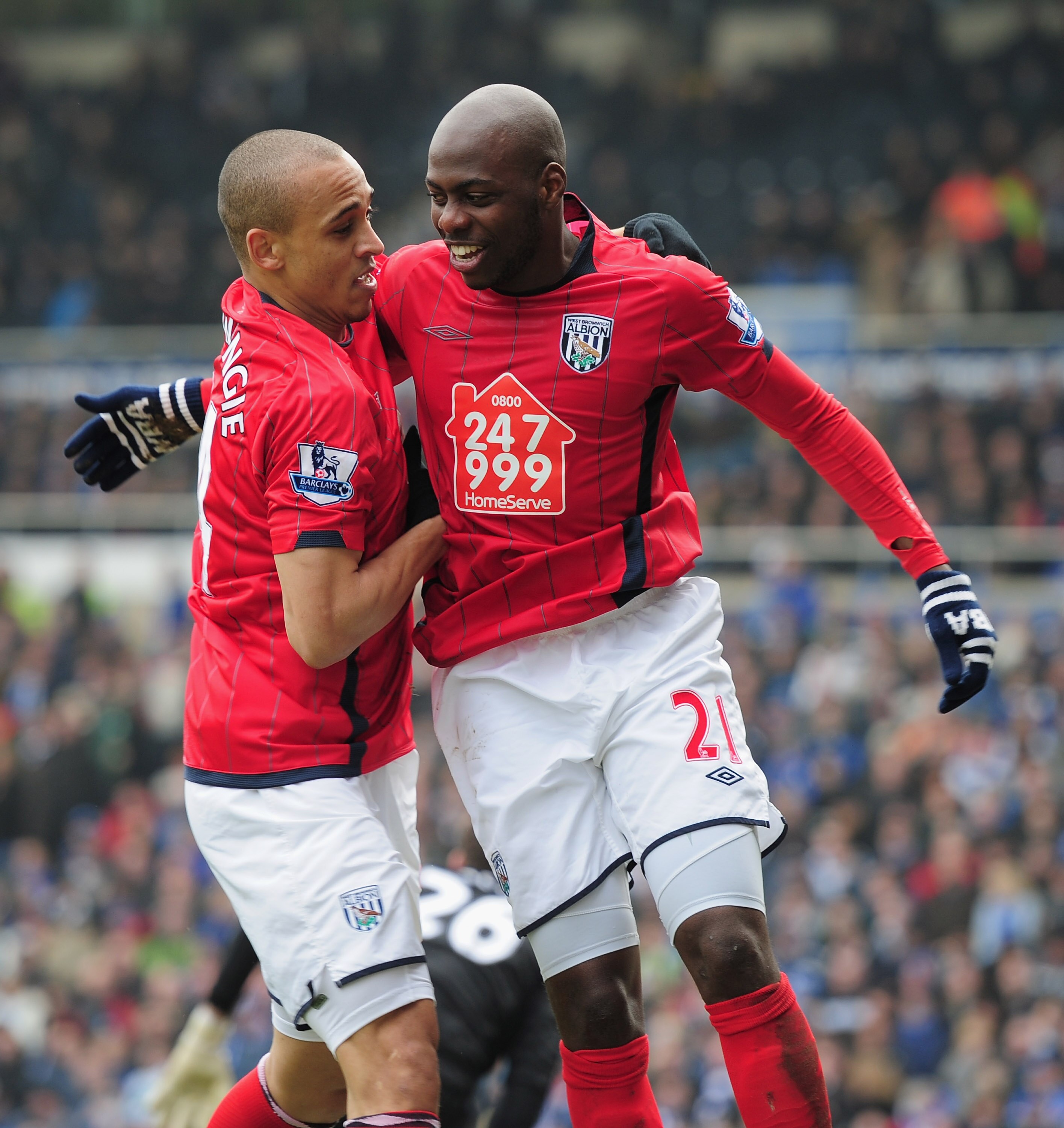 BIRMINGHAM, ENGLAND - MARCH 05:  Youssuf Mulumbu of West Bromich Albion is congratulated by team-mate Peter Odemwingie after scoring during the Barclays Premier League match between Birmingham City and West Bromwich Albion  on March 5, 2011 in Birmingham,