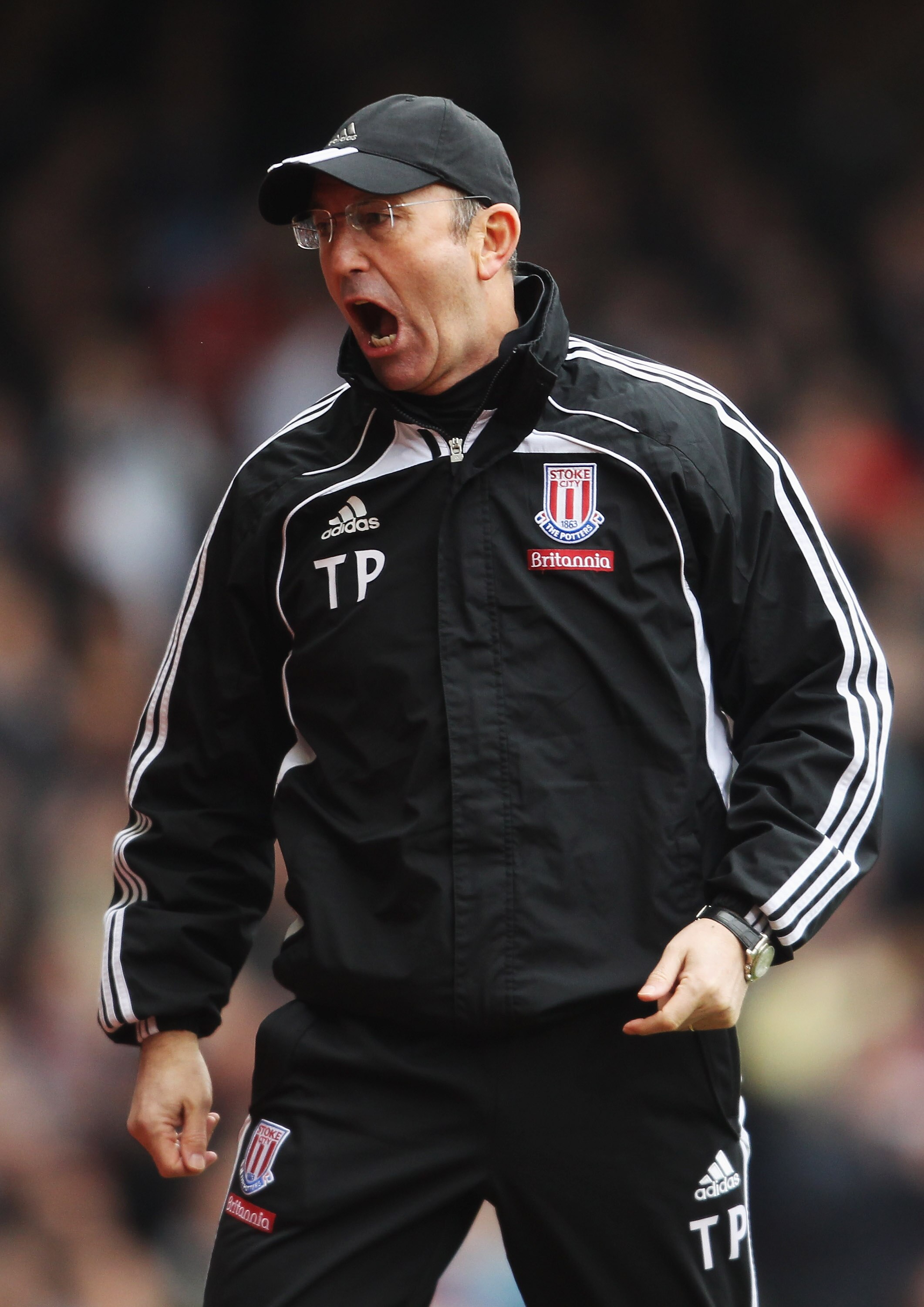 LONDON, UNITED KINGDOM - MARCH 05:  Tony Pullis the Stoke City manager gives instructions from the touchline during the Barclays Premier League match between West Ham United and Stoke City at the Boleyn Ground on March 5, 2011 in London, England.  (Photo
