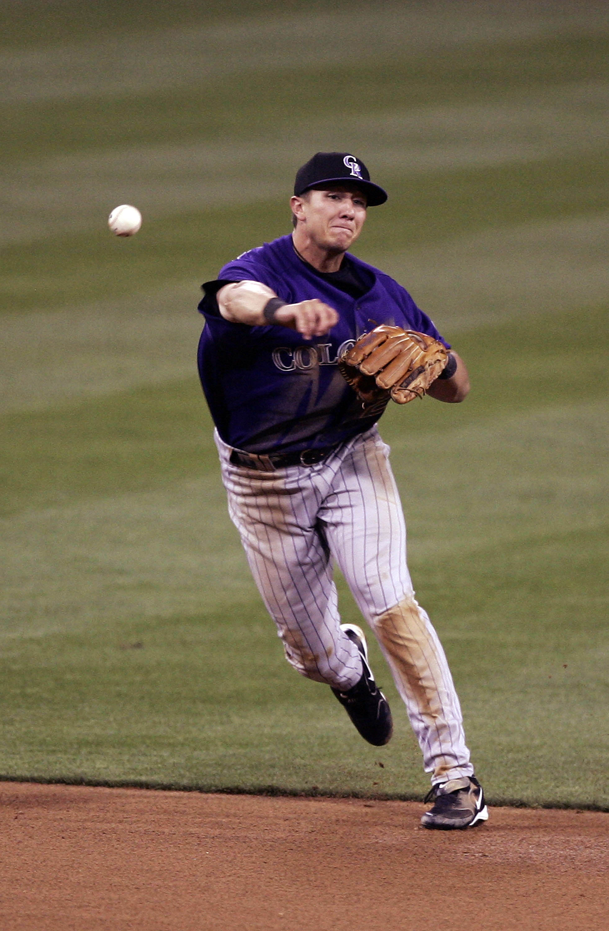 SAN DIEGO - APRIL 07:  Shortstop Troy Tulowitzki #2 of the Colorado Rockies makes a play against the San Diego Padres during their MLB game at Petco Park on April 7, 2007 in San Diego, California. (Photo by Donald Miralle/Getty Images)