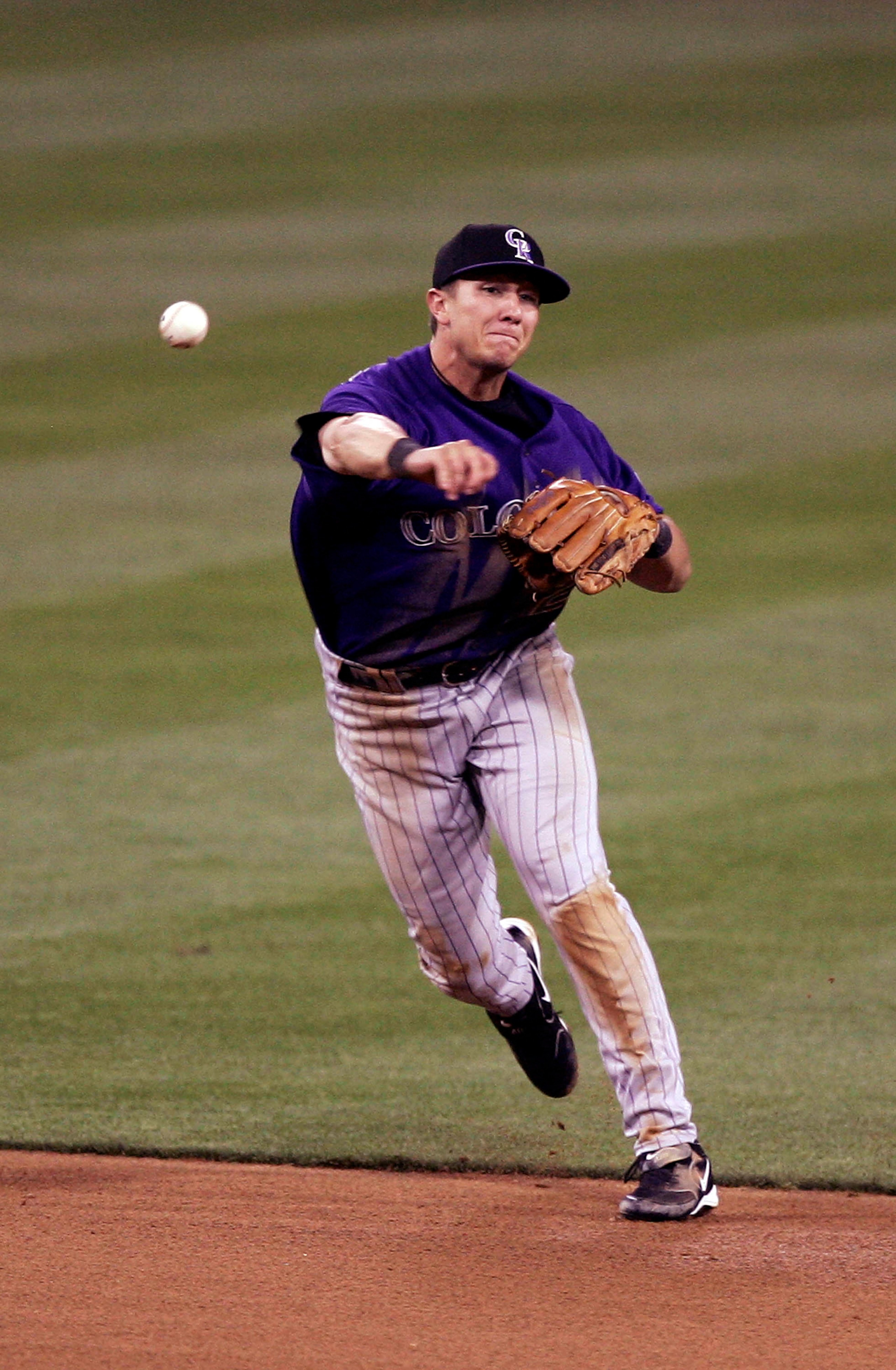 SAN DIEGO - APRIL 07:  Shortstop Troy Tulowitzki #2 of the Colorado Rockies makes a play against the San Diego Padres during their MLB game at Petco Park on April 7, 2007 in San Diego, California. (Photo by Donald Miralle/Getty Images)