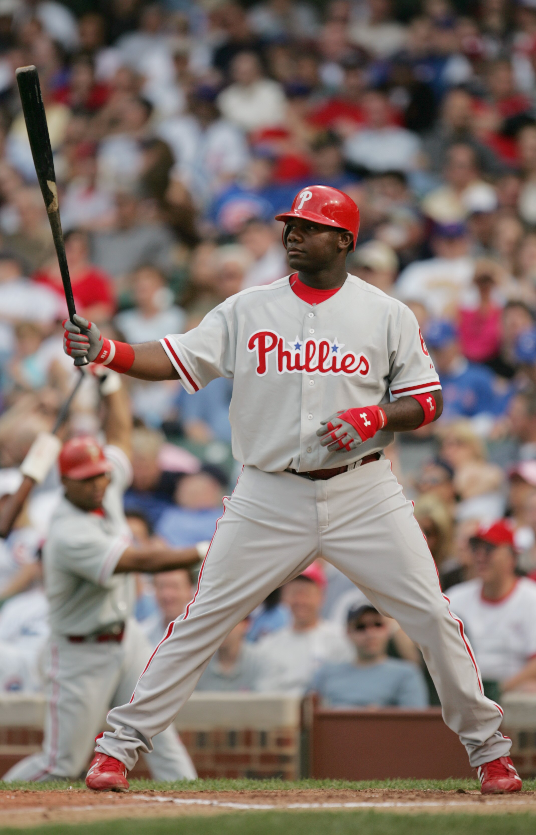 CHICAGO - MAY 6:  Ryan Howard #6 of the Philadephia Phillies bats against the Chicago Cubs during the game on May 6, 2005 at Wrigley Field in Chicago, Illinois. The Phillies defeated the Cubs 3-2. (Photo by Jonathan Daniel/Getty Images)