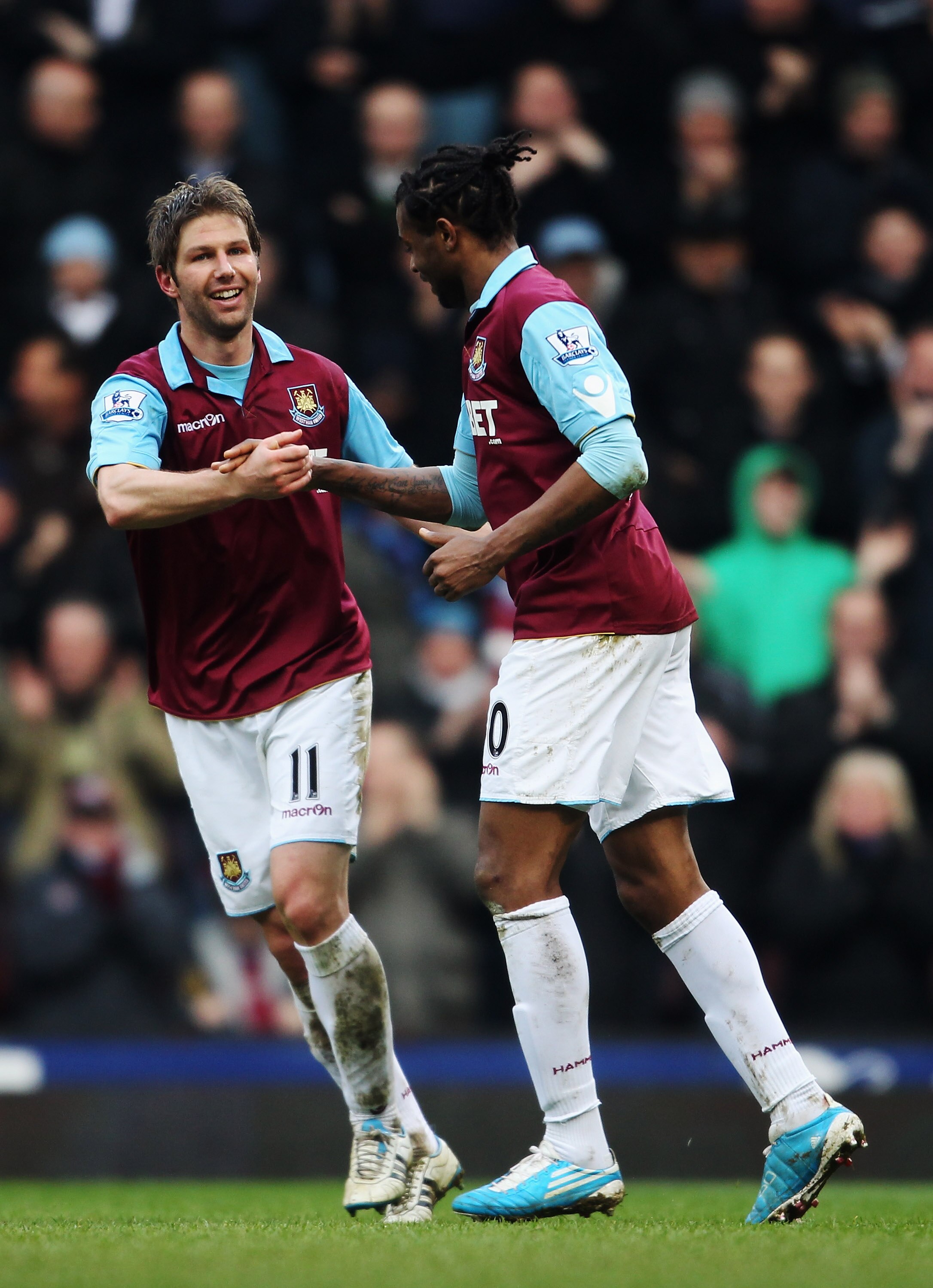 LONDON, UNITED KINGDOM - MARCH 05:  Thomas Hitzlsperger (L) of West Ham United celebrates with team mate Frederic Piquionne (R) after scoring his sides third goal during the Barclays Premier League match between West Ham United and Stoke City at the Boley