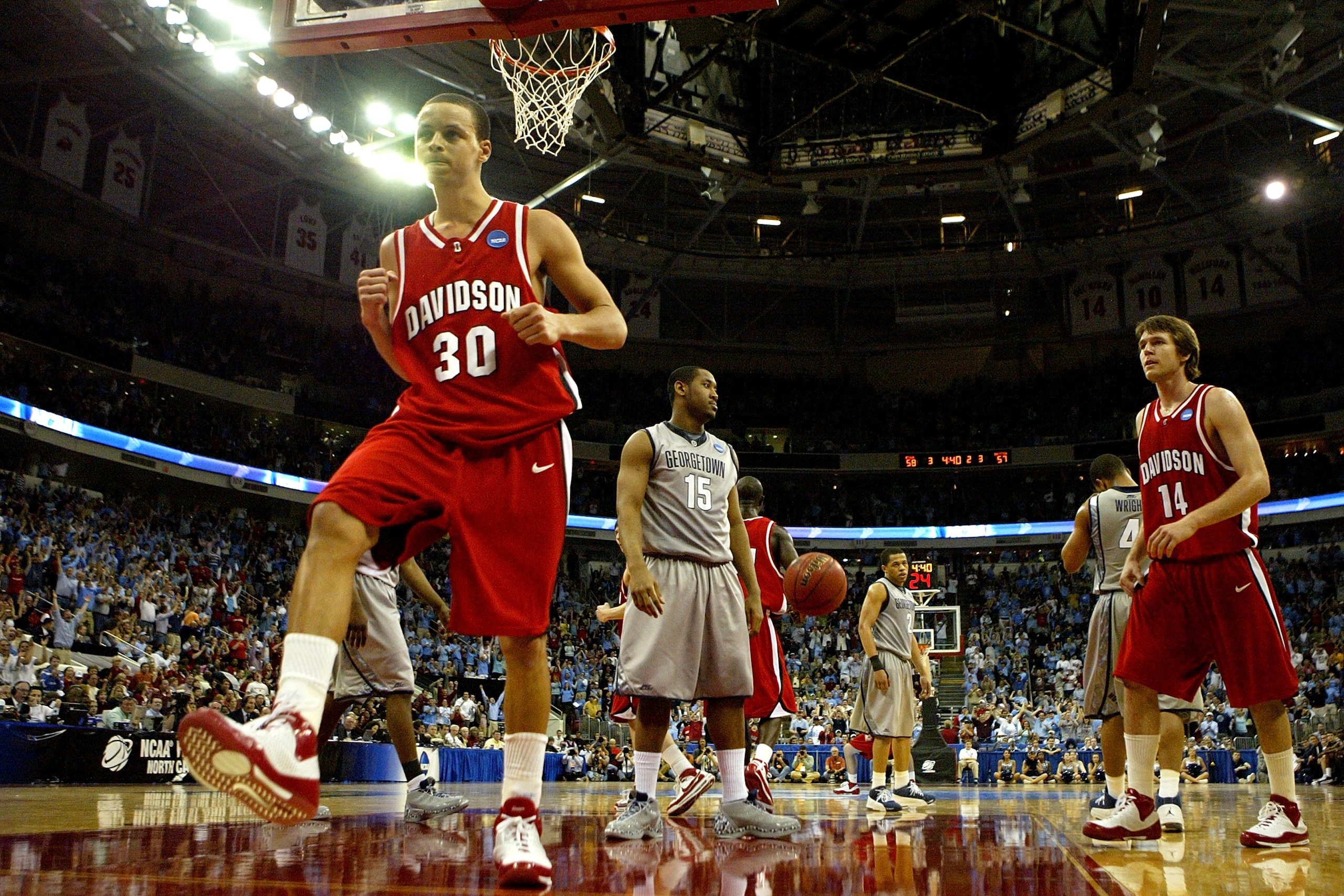 RALEIGH, NC - MARCH 23:  Stephen Curry #30 of the Davidson Wildcats celebrates after a basket against the Georgetown Hoyas during the second round of the 2008 NCAA Men's Basketball Tournament Midwest Regionals on March 23, 2008 at RBC Center in Raleigh, N