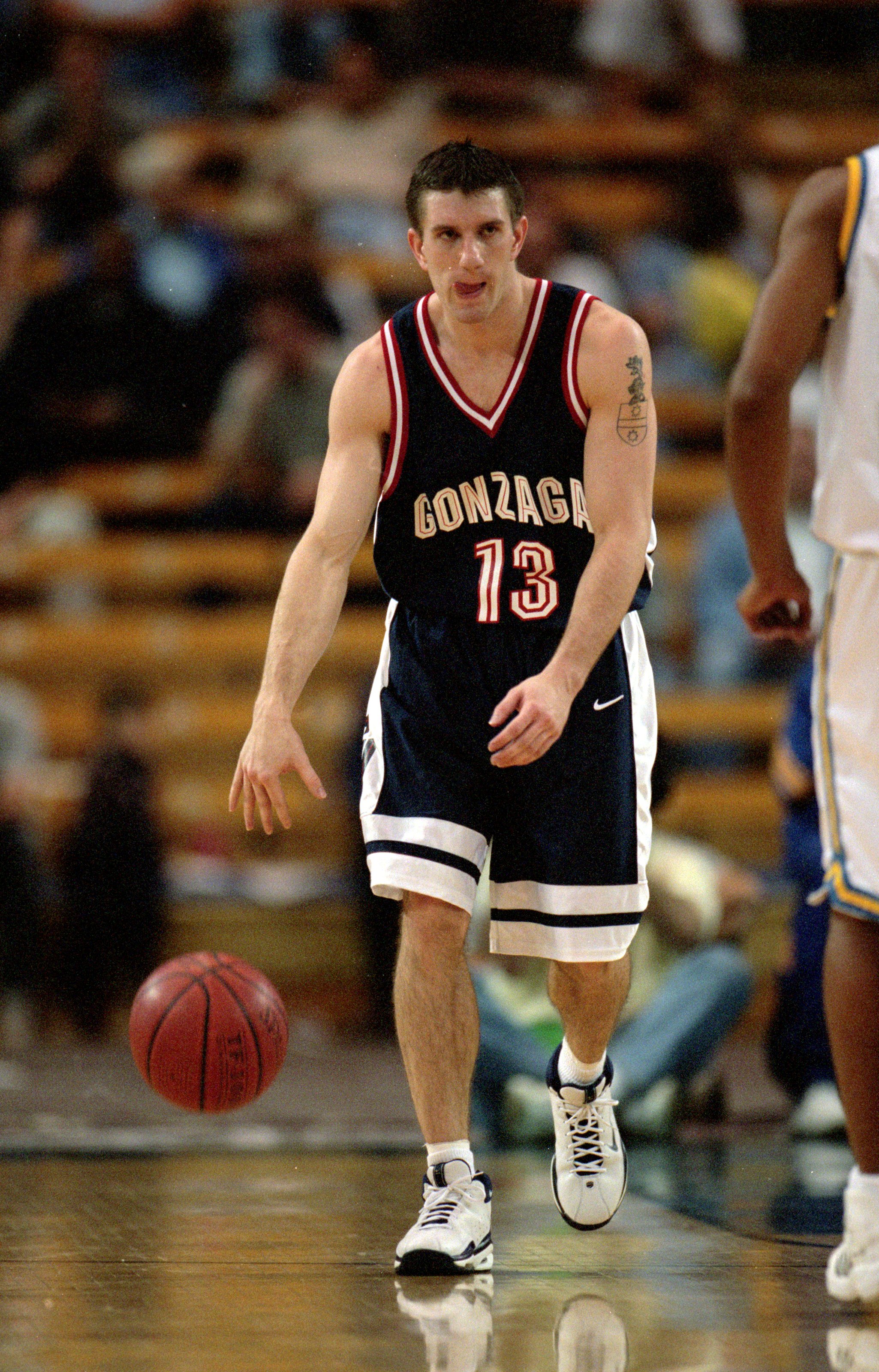 11 Dec 1999: Matt Santangelo #13 of the Gonzaga Bulldogs dribbles the ball down court during the game against the  UCLA Bruins at the Pauley Pavillion in Westwood, California. The Bulldogs defeated the Bruins 59-43. Mandatory Credit: Jeff Gross  /Allsport