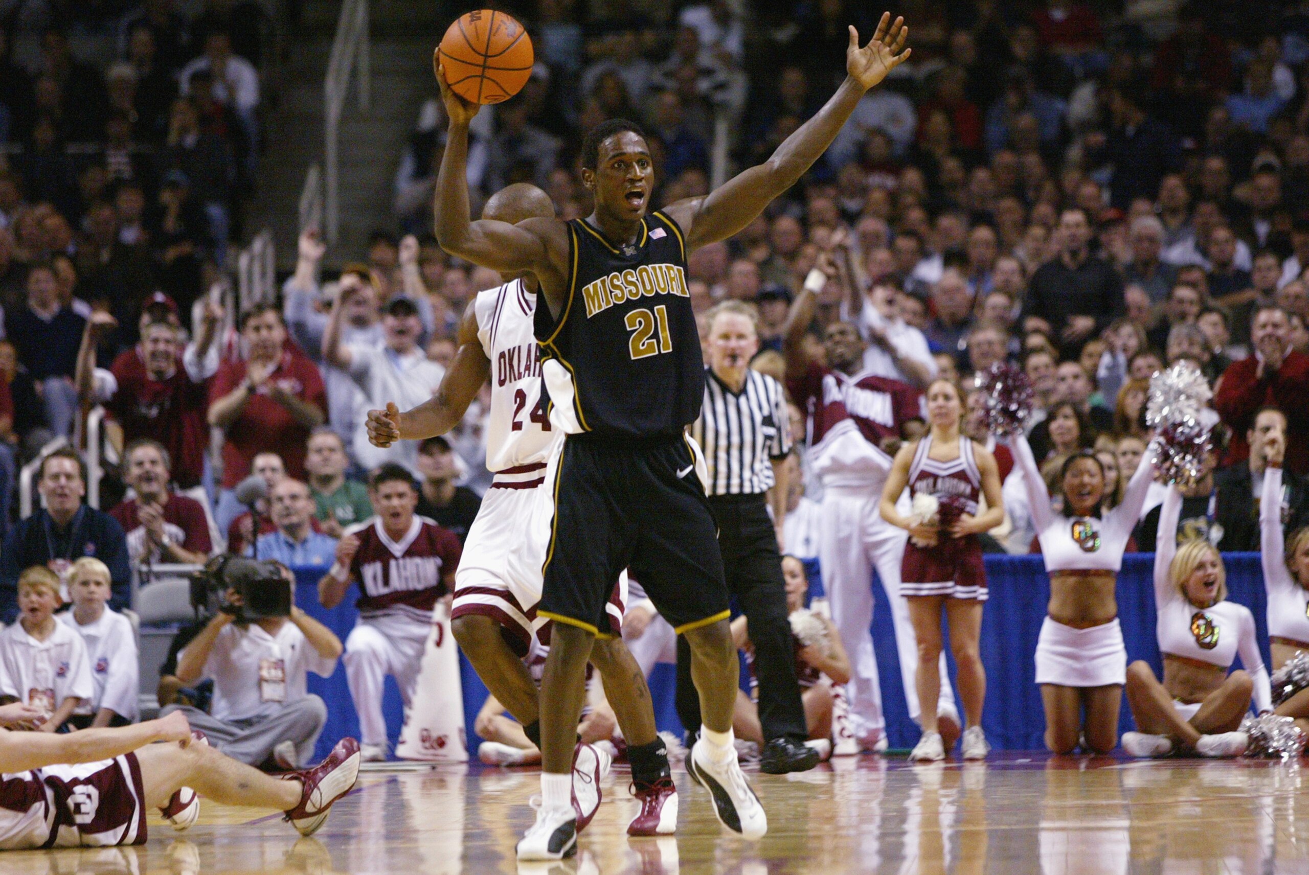 SAN JOSE, CA - MARCH 23:  Kareem Rush #21 of the Missouri Tigers argues a call during the West Regional Final of the 2002 NCAA Men's Basketball Tournament against the Oklahoma Sooners on March 23, 2002 at Compaq Center in San Jose, California.  The Sooner