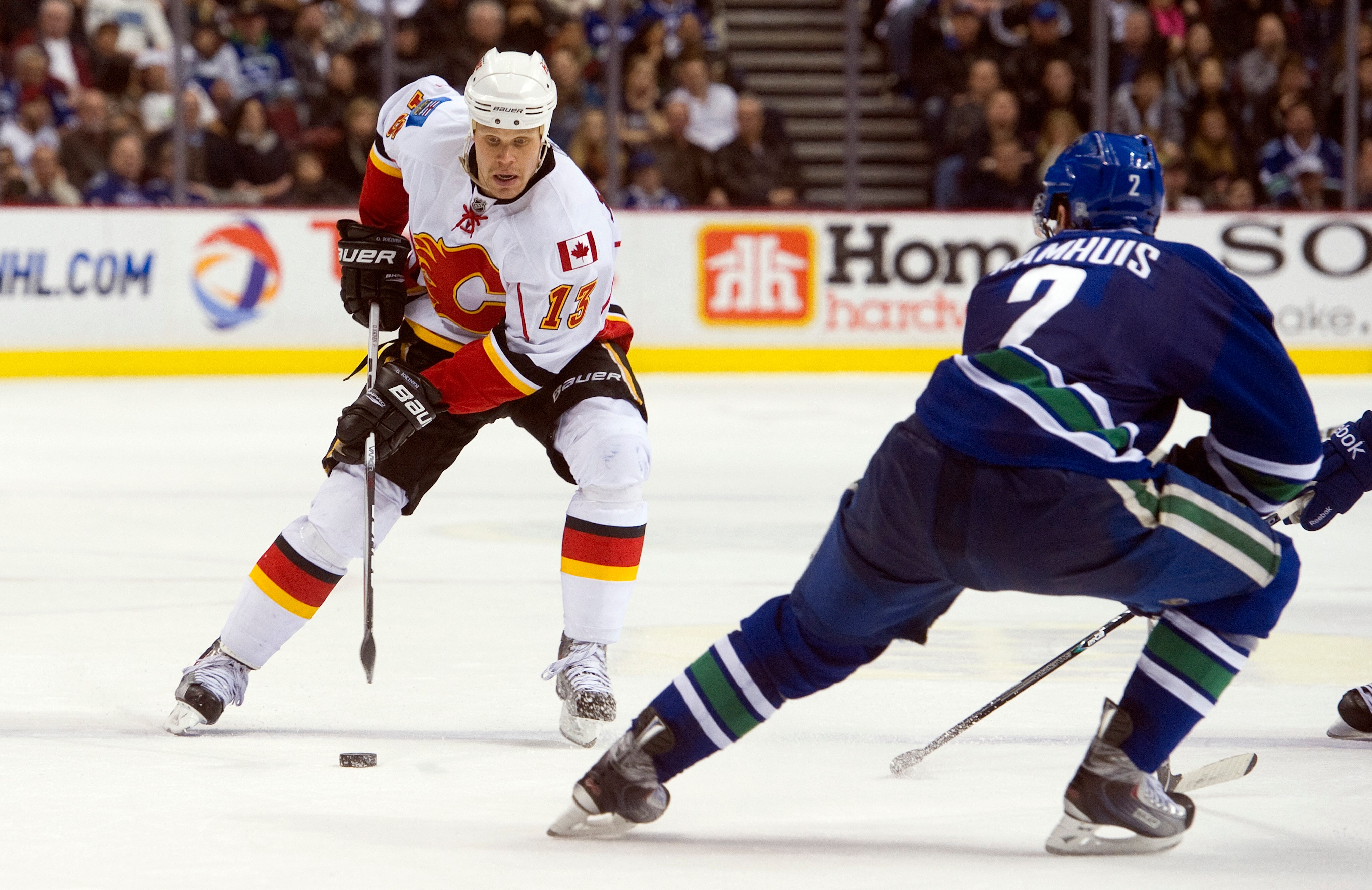 VANCOUVER, CANADA - JANUARY 22: Olli Jokinen #13 of the Calgary Flames skates with the puck during a game against the Vancouver Canucks on January 22, 2011 at Rogers Arena in Vancouver, BC, Canada. (Photo by Rich Lam/Getty Images) VANCOUVER, CANADA - JANUARY 22: Olli Jokinen #13 of the Calgary Flames skates with the puck during a game against the Vancouver Canucks on January 22, 2011 at Rogers Arena in Vancouver, BC, Canada. (Photo by Rich Lam/Getty Images)