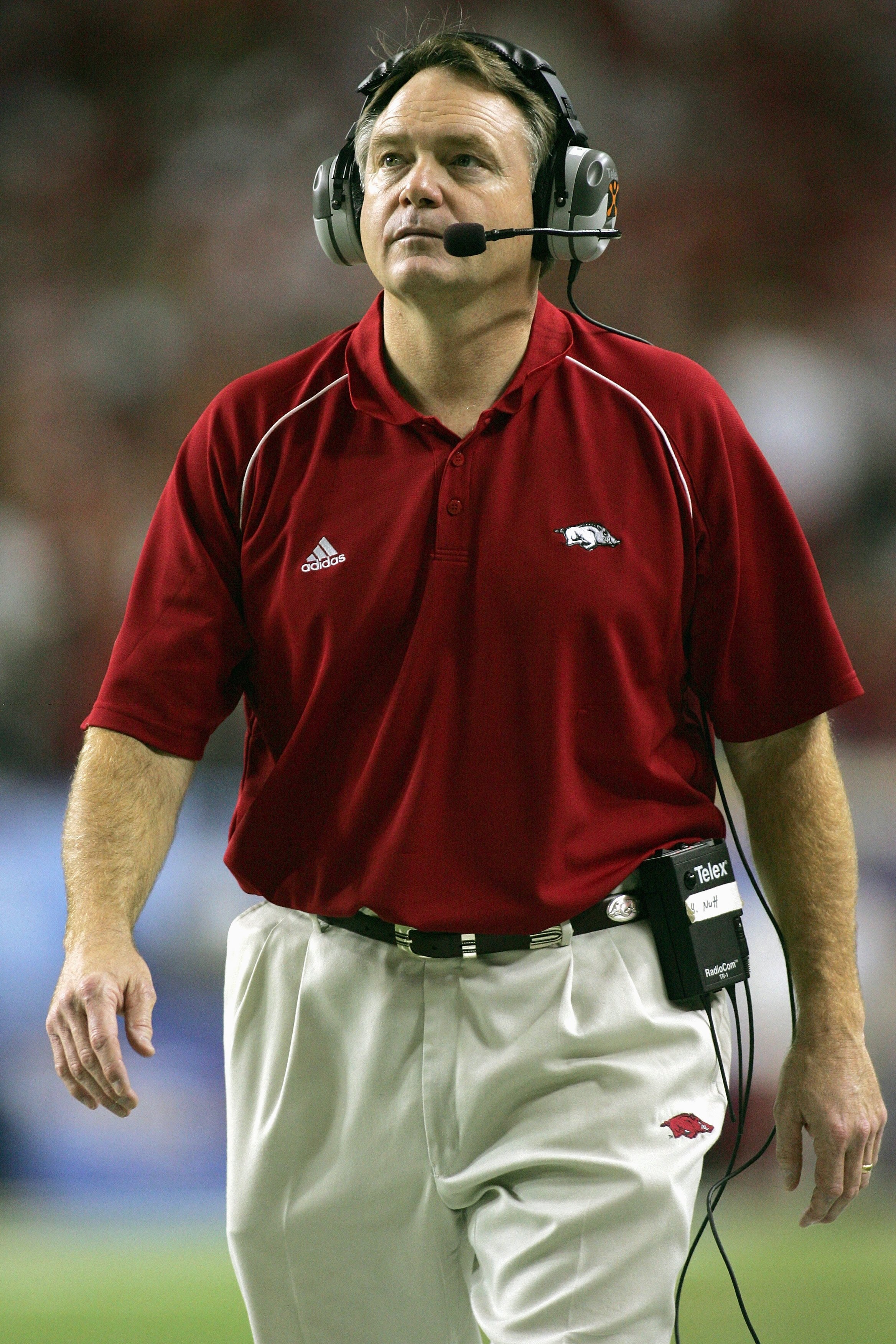 ATLANTA - DECEMBER 2:  Head coach Houston Nutt of the Arkansas Razorbacks walks on the sidelines against the Florida Gators during the 2006 SEC Championship Game at the Georgia Dome December 2, 2006 in Atlanta, Georgia. (Photo by Ronald Martinez/Getty Ima