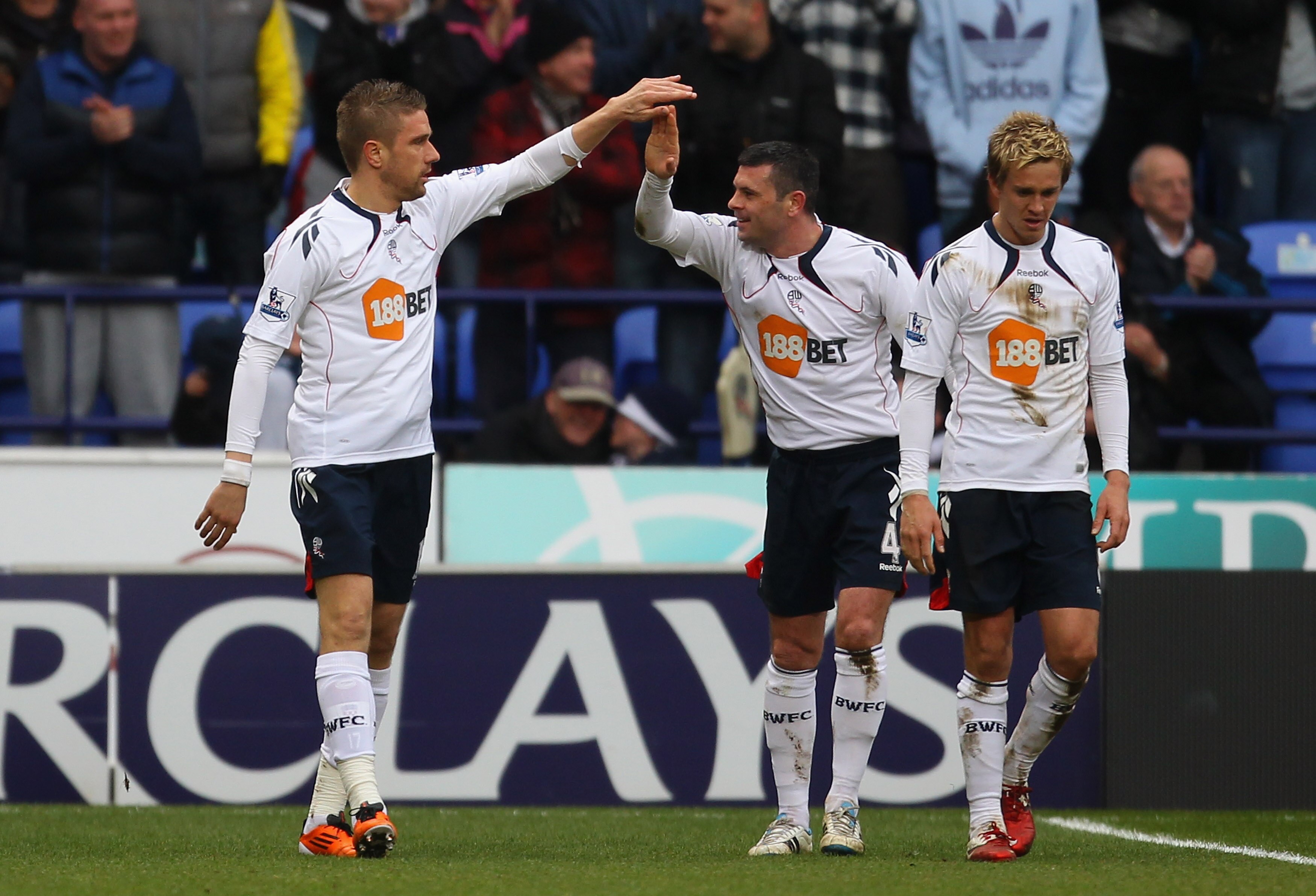 BOLTON, ENGLAND - MARCH 05:  Ivan Klasnic of Bolton Wanderers celebrates with Paul Robinson after scoring the winning goal during the Barclays Premier League match between Bolton Wanderers and Aston Villa at the Reebok Stadium on March 5, 2011 in Bolton,
