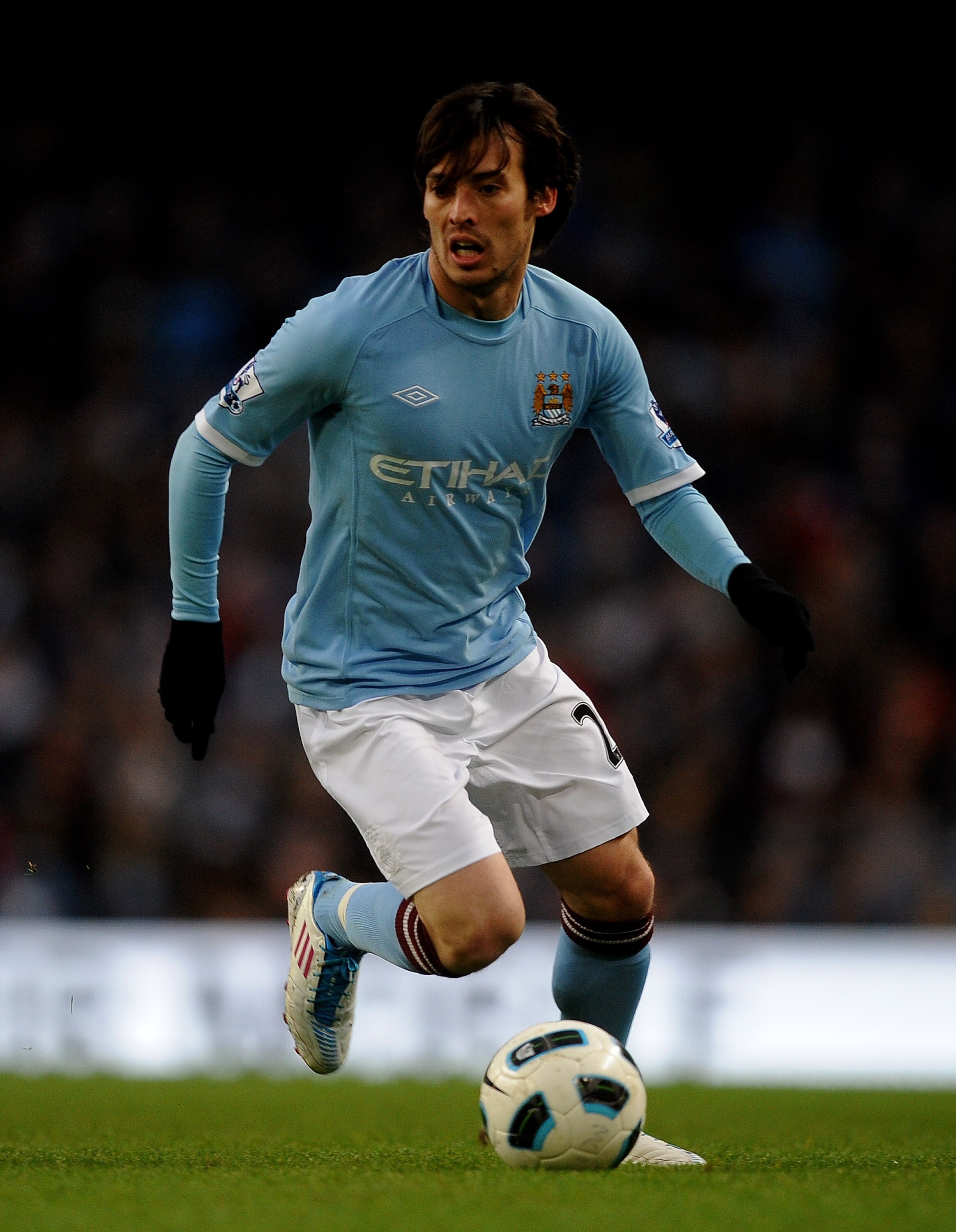 MANCHESTER, ENGLAND - MARCH 05:  David Silva of Manchester City in action during the Barclays Premier League match between Manchester City and Wigan Athletic at the City of Manchester Stadium on March 5, 2011 in Manchester, England.  (Photo by Laurence Gr