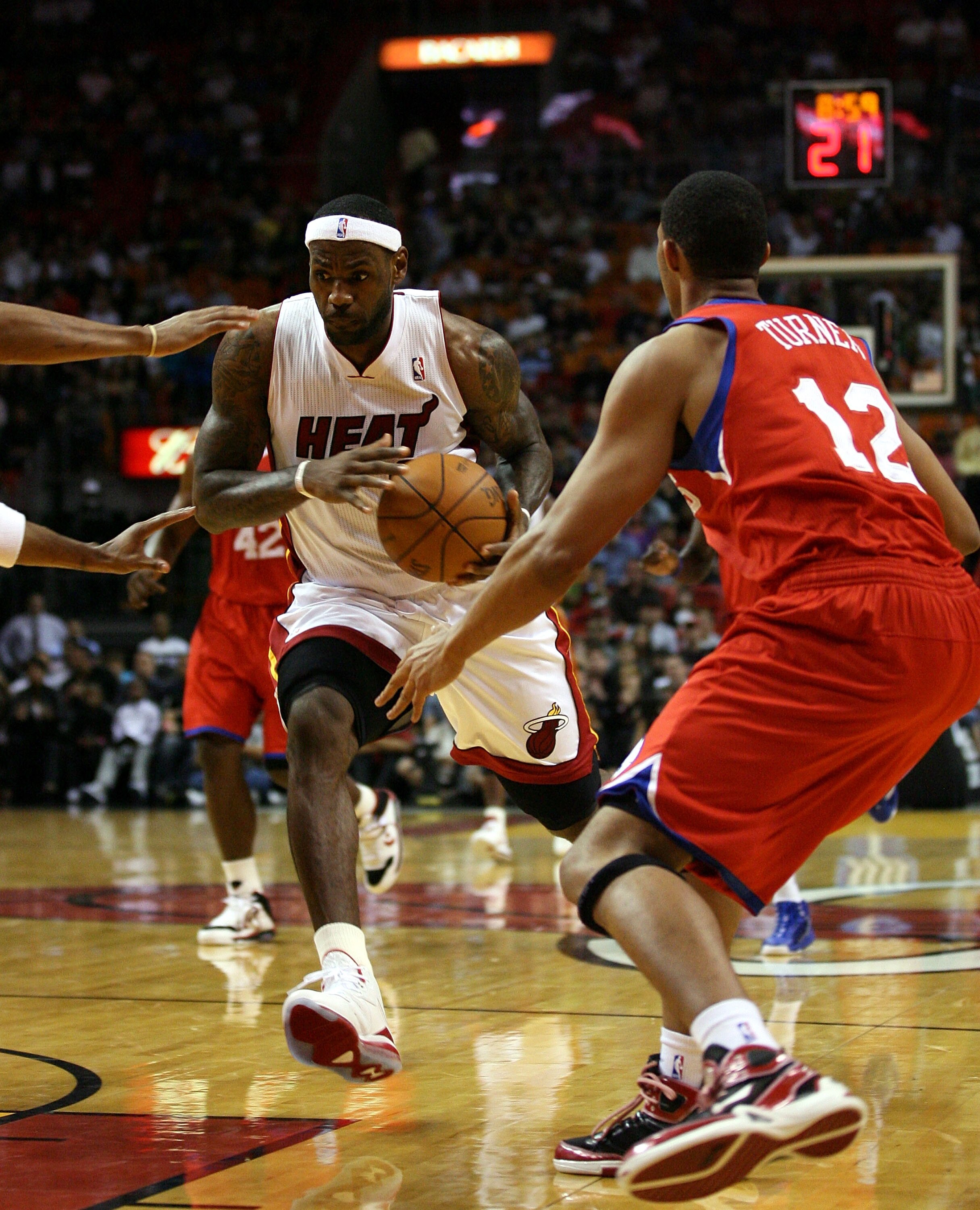 MIAMI - NOVEMBER 26:  LeBron James #6 of the Miami Heat protects the ball from the Philadelphia 76ers at American Airlines Arena on November 26, 2010 in Miami, Florida. The Heat defeated the 76ers 99-90. NOTE TO USER: User expressly acknowledges and agree