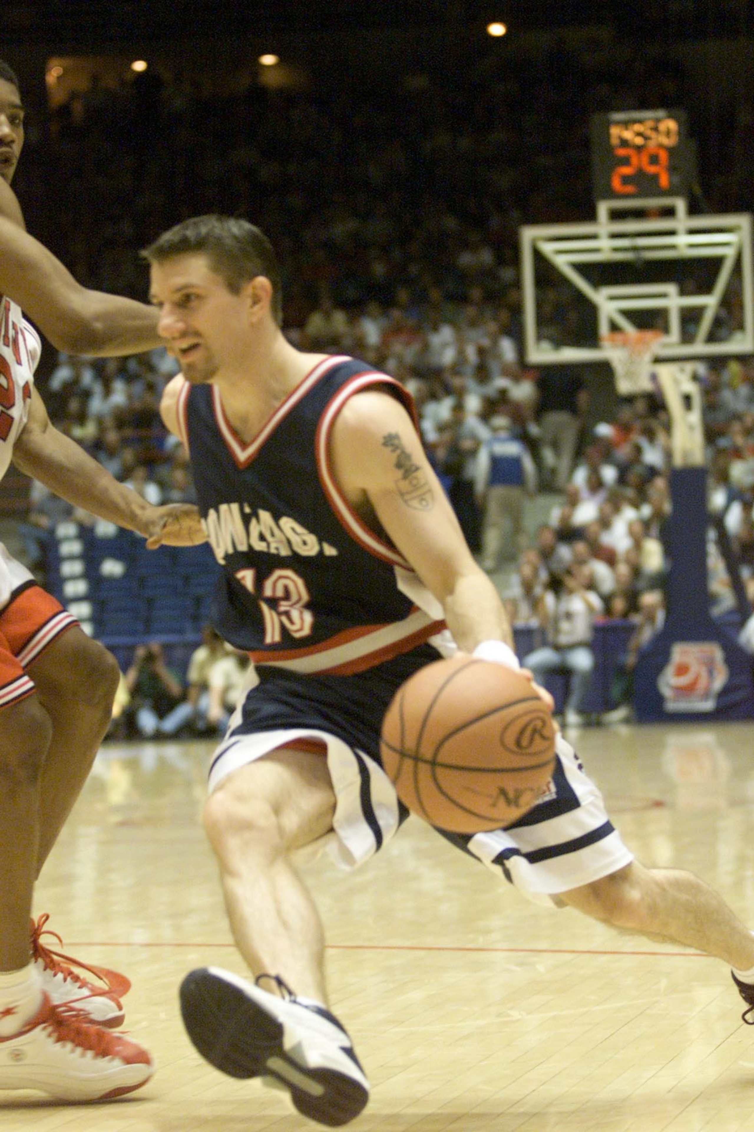 16 Mar 2000:  Matt Santangelo of Gonzaga drives against Louisville during the first round of the Western Regional NCAA Tournament at the McKale Center in Tucson, Arizona. X DIGITAL IMAGE Mandatory Credit: Jed Jacobsohn/ALLSPORT