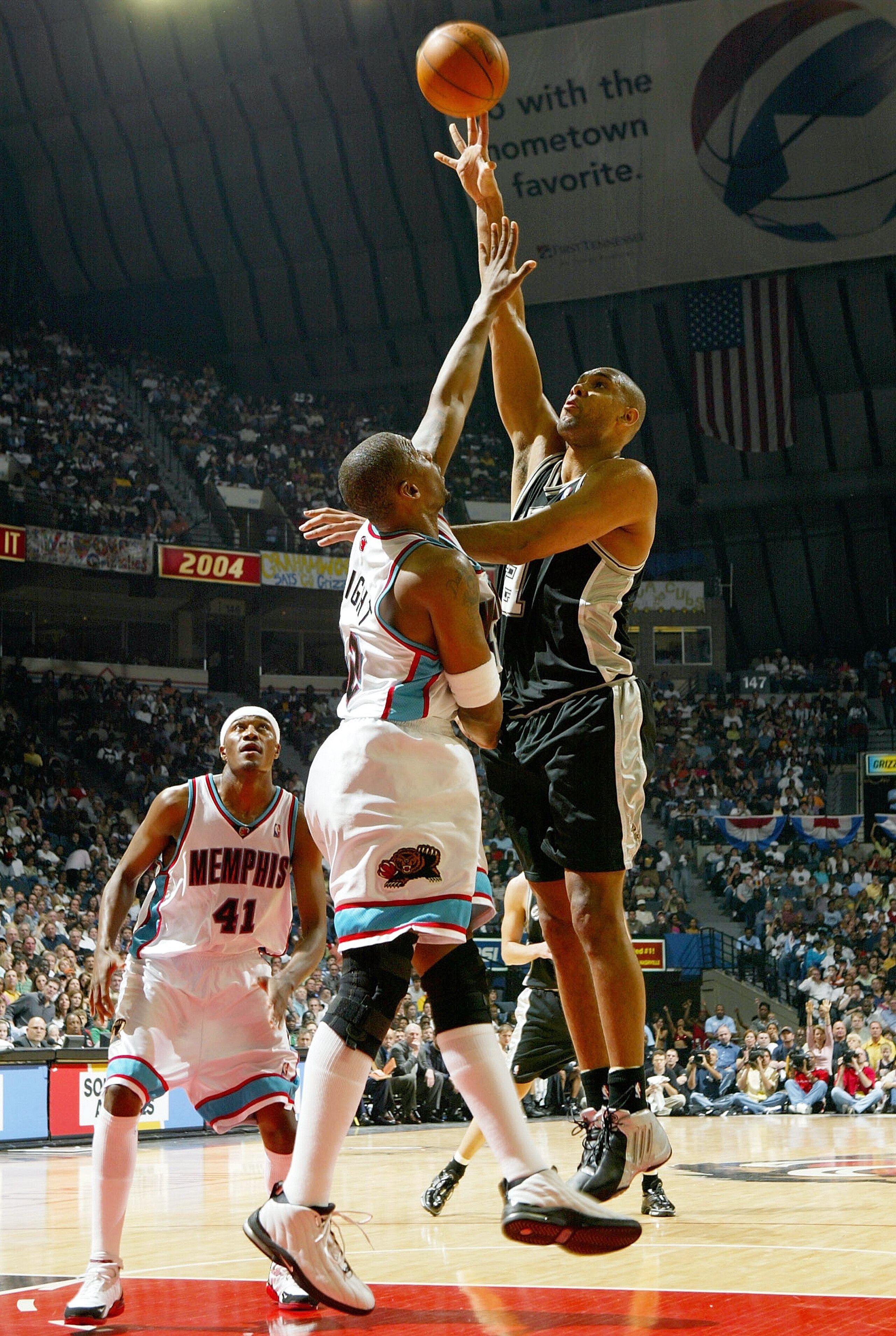 MEMPHIS, TN - APRIL 25: Tim Duncan #21 of San Antonio Spurs puts up a shot over Lorenzen Wright #42 of the Memphis Grizzlies during Game four of Western Conference Quarterfinals of the 2004 NBA Playoffs April 25, 2004 at The Pyramid in Memphis Tennessee. MEMPHIS, TN - APRIL 25: Tim Duncan #21 of San Antonio Spurs puts up a shot over Lorenzen Wright #42 of the Memphis Grizzlies during Game four of Western Conference Quarterfinals of the 2004 NBA Playoffs April 25, 2004 at The Pyramid in Memphis Tennessee.