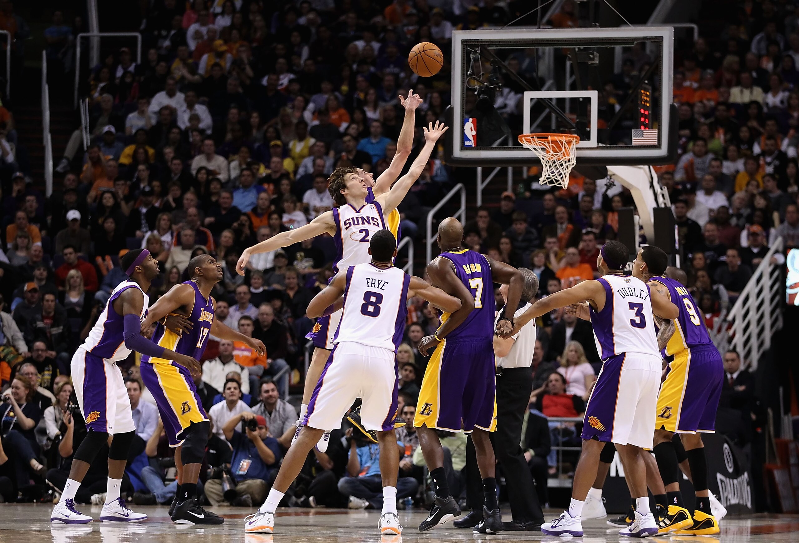 PHOENIX, AZ - JANUARY 05: Goran Dragic #2 of the Phoenix Suns reaches for a jump ball against the Los Angeles Lakers during the NBA game at US Airways Center on January 5, 2011 in Phoenix, Arizona. The Lakers defeated the Suns 99-95. NOTE TO USER: User PHOENIX, AZ - JANUARY 05: Goran Dragic #2 of the Phoenix Suns reaches for a jump ball against the Los Angeles Lakers during the NBA game at US Airways Center on January 5, 2011 in Phoenix, Arizona. The Lakers defeated the Suns 99-95. NOTE TO USER: User