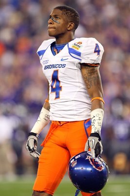 GLENDALE, AZ - JANUARY 04:  Titus Young #4 of the Boise State Broncos looks on against the TCU Horned Frogs during the Tostitos Fiesta Bowl at the Universtity of Phoenix Stadium on January 4, 2010 in Glendale, Arizona.  (Photo by Christian Petersen/Getty