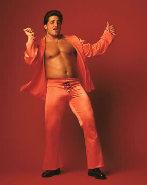 He looks like the flamboyant younger brother of Tony Manero from Saturday Night Fever.