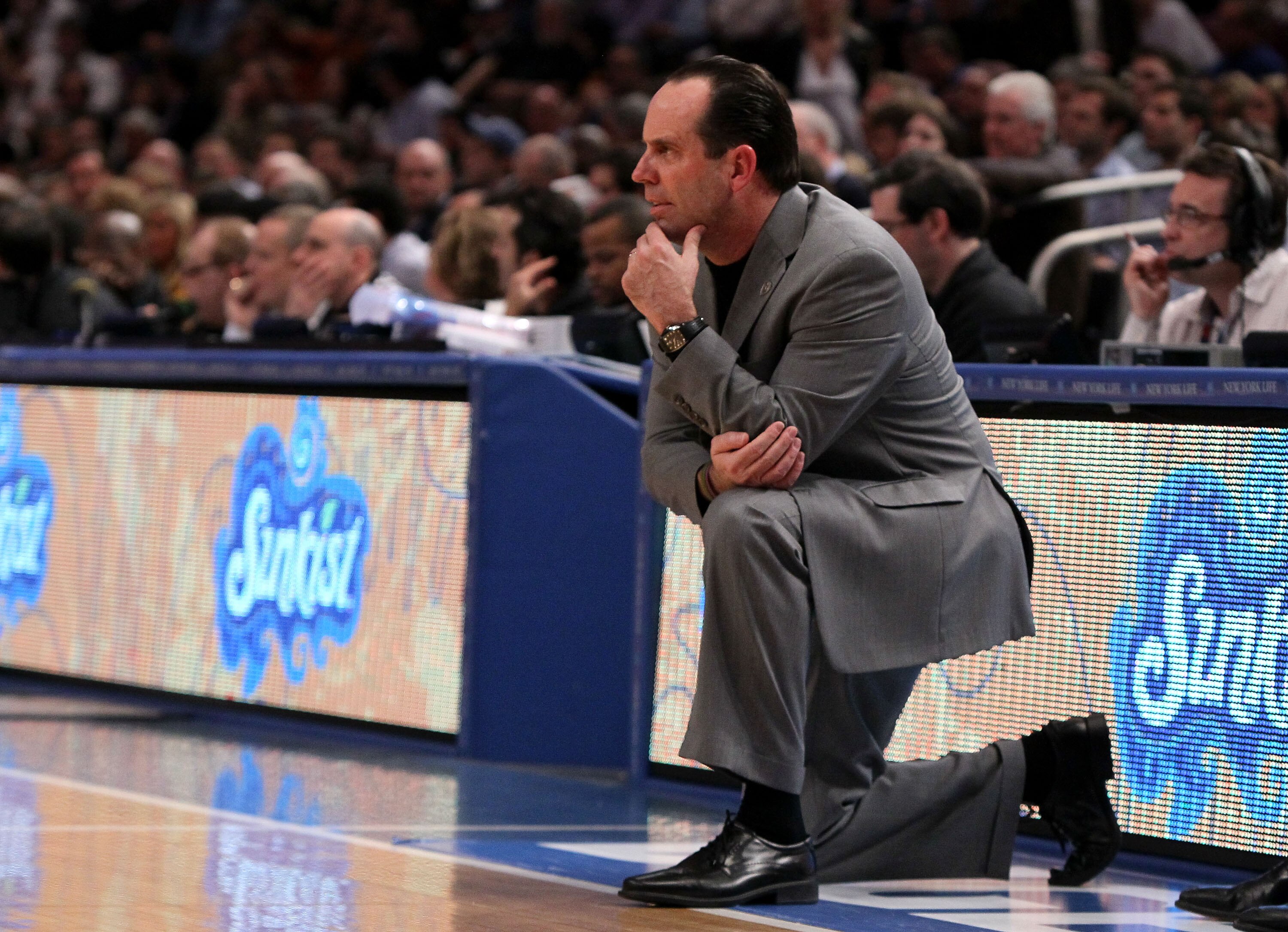 NEW YORK - MARCH 12: Head coach Mike Brey of the Notre Dame Fighting Irish looks on from the bench against the West Virginia Mountaineers during the semifinal of the 2010 Big East Tournament at Madison Square Garden on March 12, 2010 in New York City.  (P