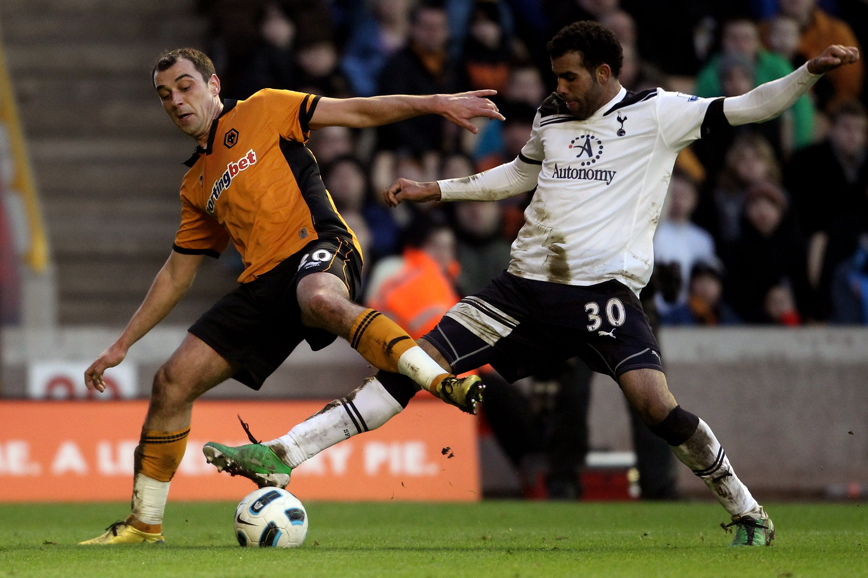WOLVERHAMPTON, ENGLAND - MARCH 06:  Nenad Milijas (L) of Wolves is challenged by Sandro of Tottenham during the Barclays Premier League match between Wolverhampton Wanderers and Tottenham Hotspur at Molineux on March 6, 2011 in Wolverhampton, England.  (P