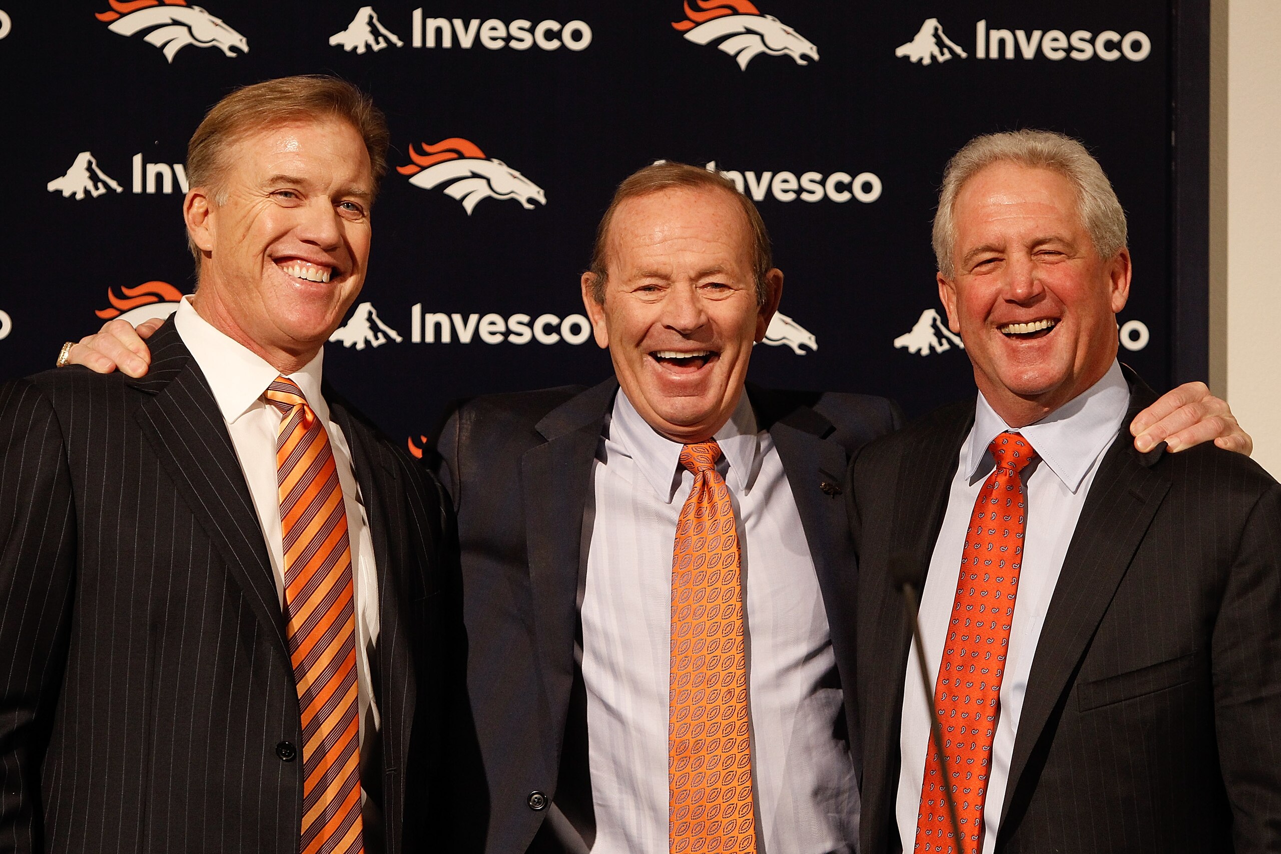ENGLEWOOD, CO - JANUARY 14: Denver Broncos vice president of football operations John Elway (L), owner Pat Bowlen and new head coach John Fox share a laugh before Fox addressed the media at Dove Valley on January 14, 2011 in Englewood, Colorado. Fox was ENGLEWOOD, CO - JANUARY 14: Denver Broncos vice president of football operations John Elway (L), owner Pat Bowlen and new head coach John Fox share a laugh before Fox addressed the media at Dove Valley on January 14, 2011 in Englewood, Colorado. Fox was