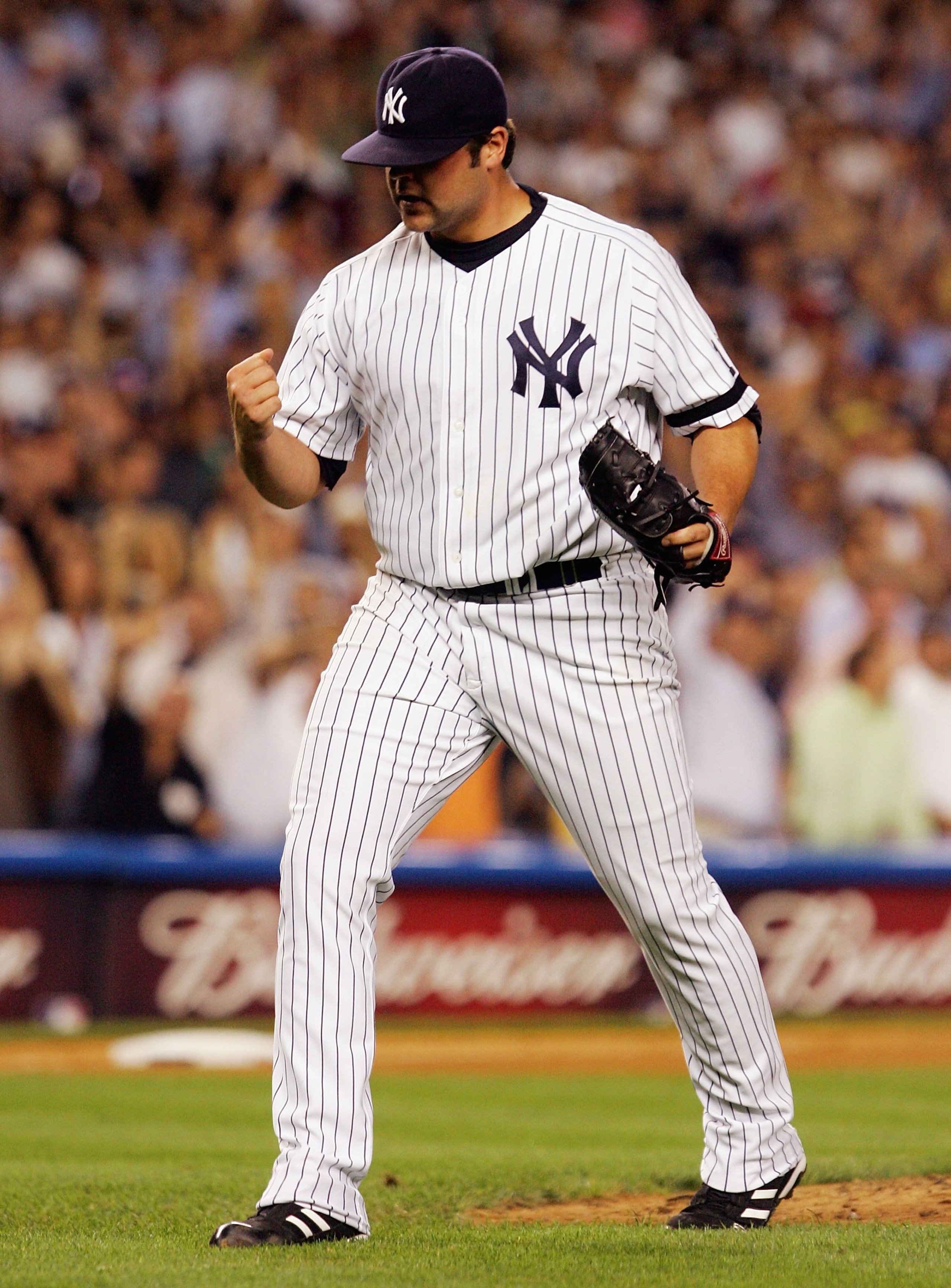 BRONX, NY - AUGUST 28:  Joba Chamberlain #62 of the New York Yankees pumps his fist against the Boston Red Sox during their game at Yankee Stadium on August 28, 2007 in the Bronx, New York. The Yankees won 5-3. (Photo by Jim McIsaac/Getty Images)