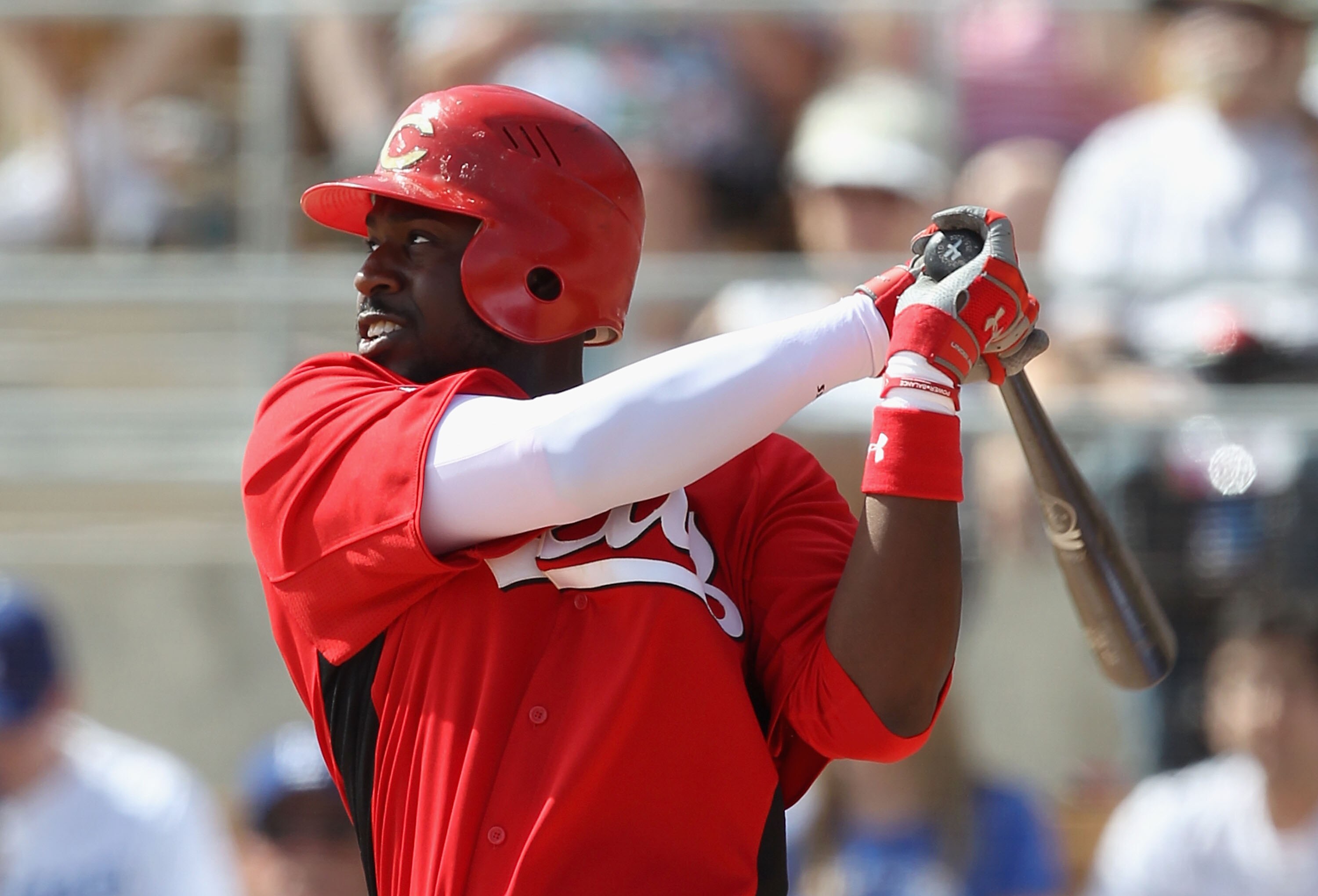 GLENDALE, AZ - MARCH 05:  Brandon Phillips #4 of the Cincinnati Reds bats against the Los Angeles Dodgers during the spring training game at Camelback Ranch on March 5, 2011 in Glendale, Arizona.  (Photo by Christian Petersen/Getty Images)