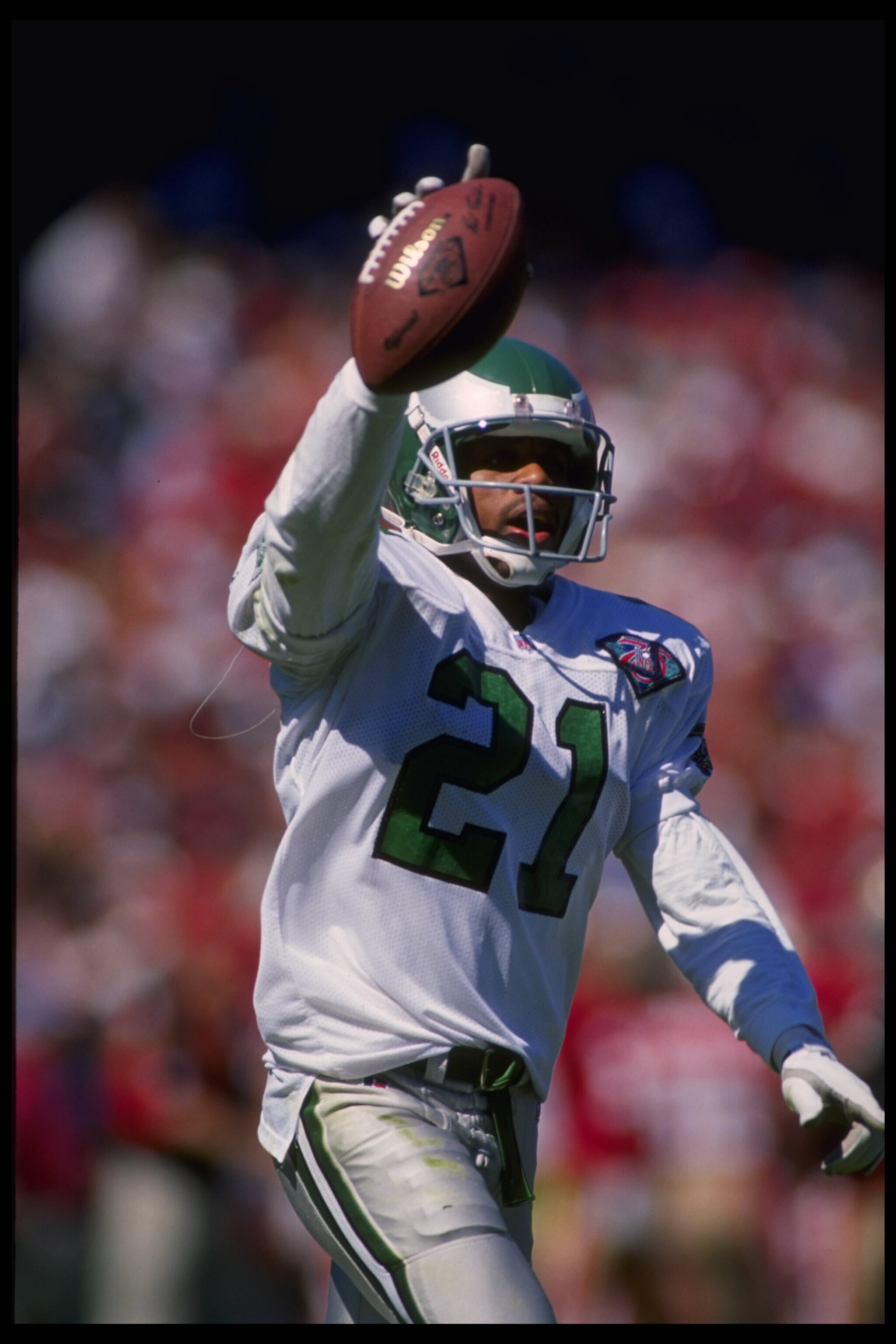 2 Oct 1994:  Running back Eric Allen #21 of the Philadelphia Eagles holds his touchdown ball aloft for fans at 3COM Park in San Francisco, California, where the Eagles swamped the 49ers 40-8.  Mandatory Credit:  Otto Greule/Allsport