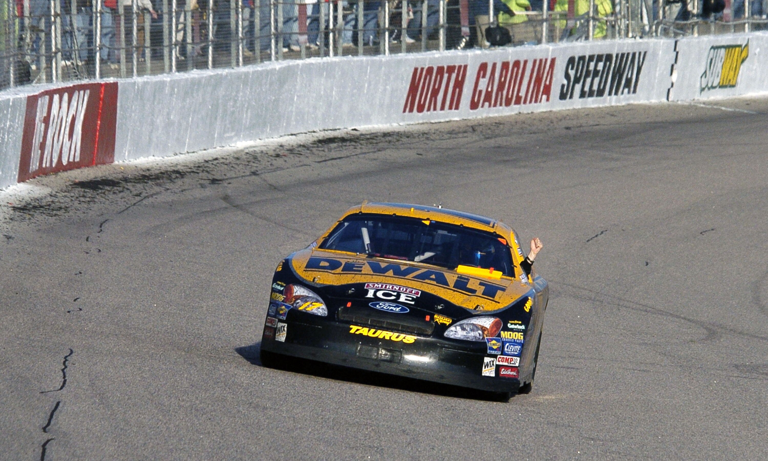 Matt Kenseth waives to the fans after winning the Subway 400, NASCAR race, February 22, 2004 at North Carolina Speedway, Rockingham, North Carolina. (Photo by A. Messerschmidt/Getty Images)