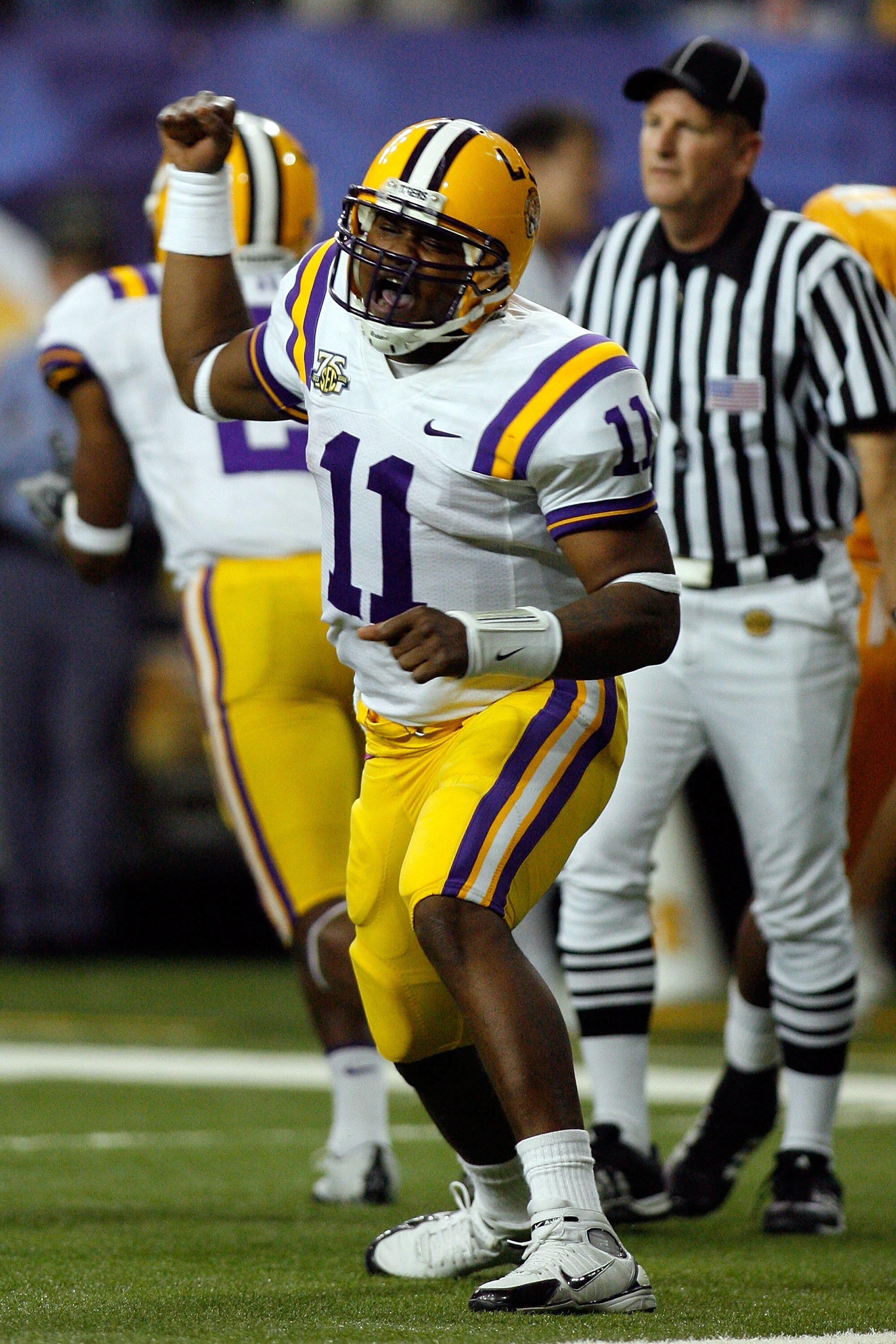 ATLANTA - DECEMBER 01:  Quarterback Ryan Perrilloux #11 of the Louisiana State University Tigers celebrates after throwing a touchdown pass against the University of Tennessee Volunteers in the SEC Championship game on December 1, 2007 at the Georgia Dome