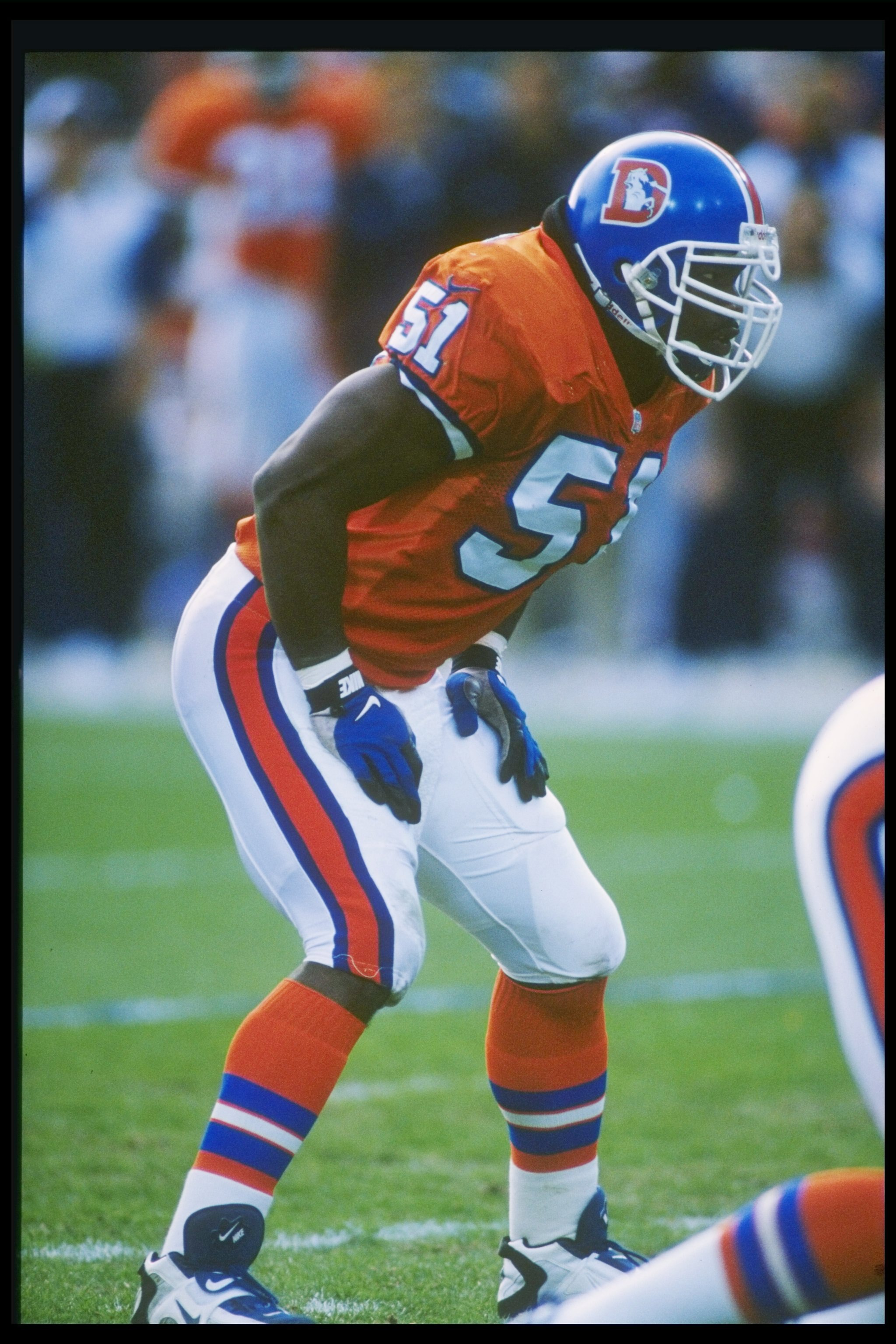 10 Nov 1996:  Linebacker John Mobley of the Denver Broncos looks on during a game against the Chicago Bears at Mile High Stadium in Denver, Colorado.  The Broncos won the game, 17-12. Mandatory Credit: Steve Dykes  /Allsport