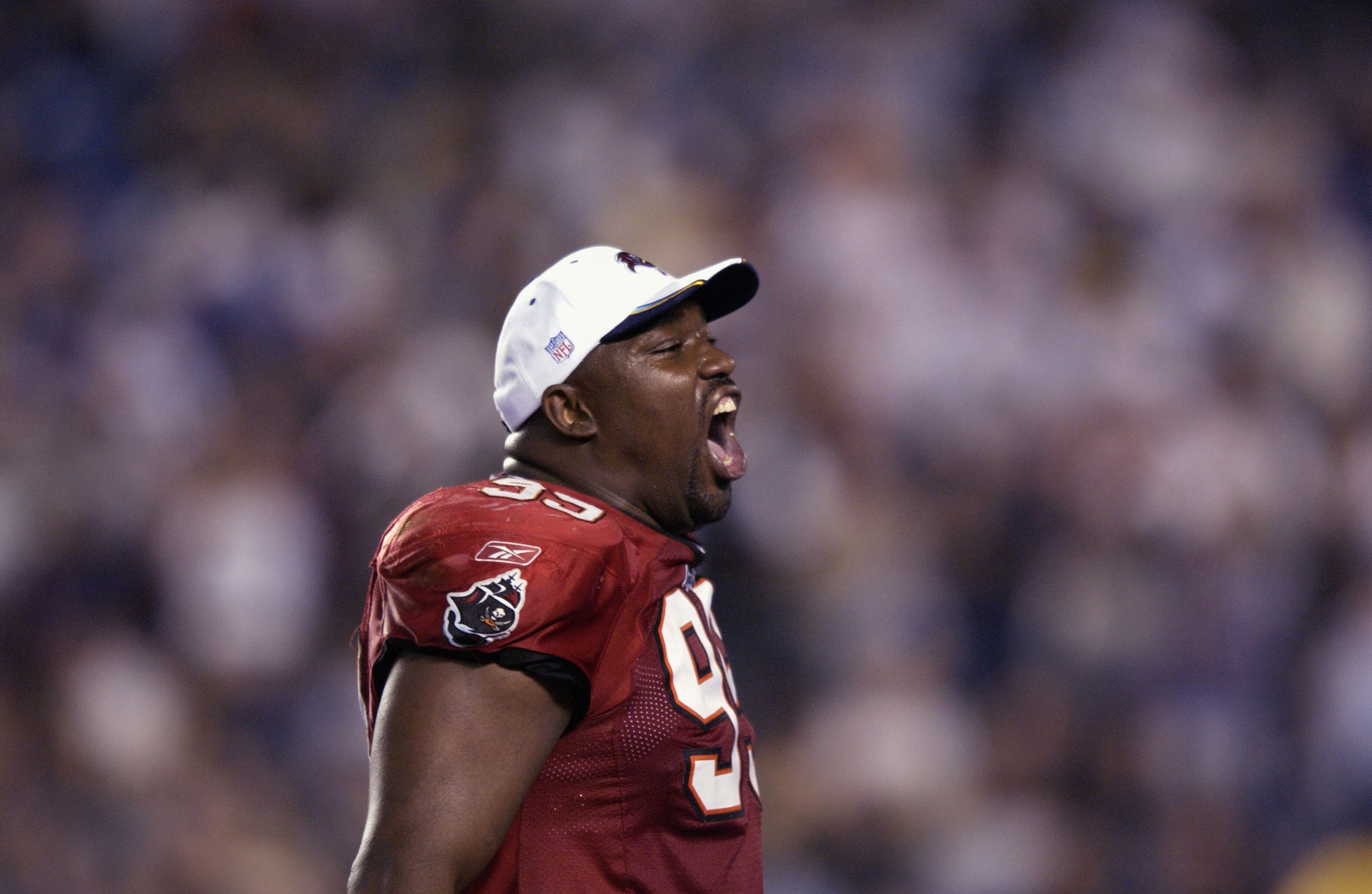SAN DIEGO - JANUARY 26:  Warren Sapp #99 of the Tampa Bay Buccaneers celebrates the victory over the Oakland Raiders in Super Bowl XXXVII on January 26, 2003 at Qualcomm Stadium in San Diego, California.  The Buccaneers won 48-21.  (Photo by Ezra Shaw/Get