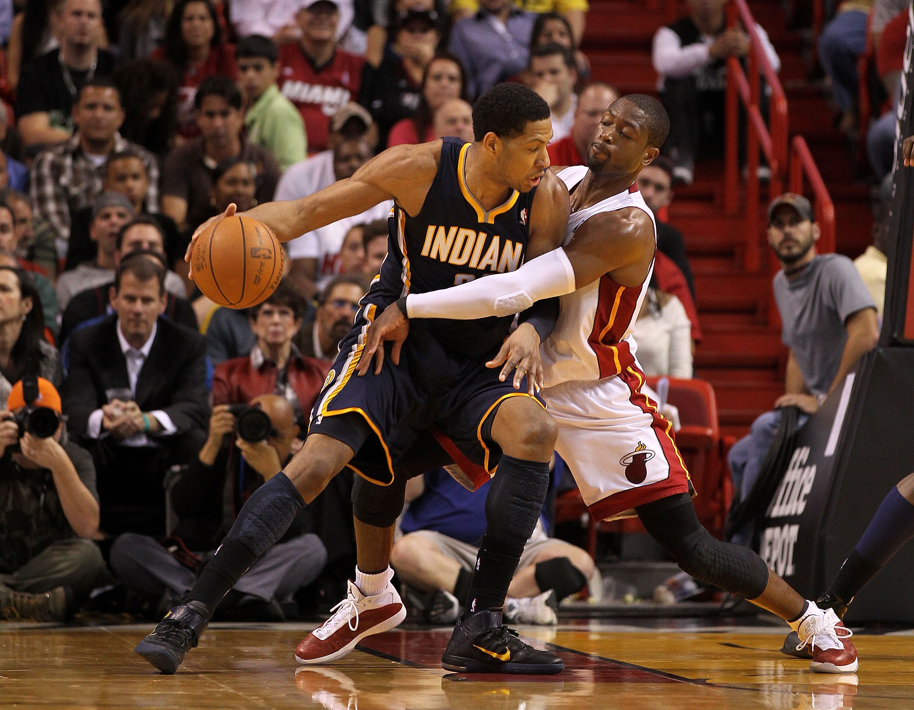 MIAMI, FL - FEBRUARY 08:  Lance Stephenson #6  of the Indiana Pacers posts up Dwyane Wade #3 of the Miami Heat during a game at American Airlines Arena on February 8, 2011 in Miami, Florida. NOTE TO USER: User expressly acknowledges and agrees that, by do