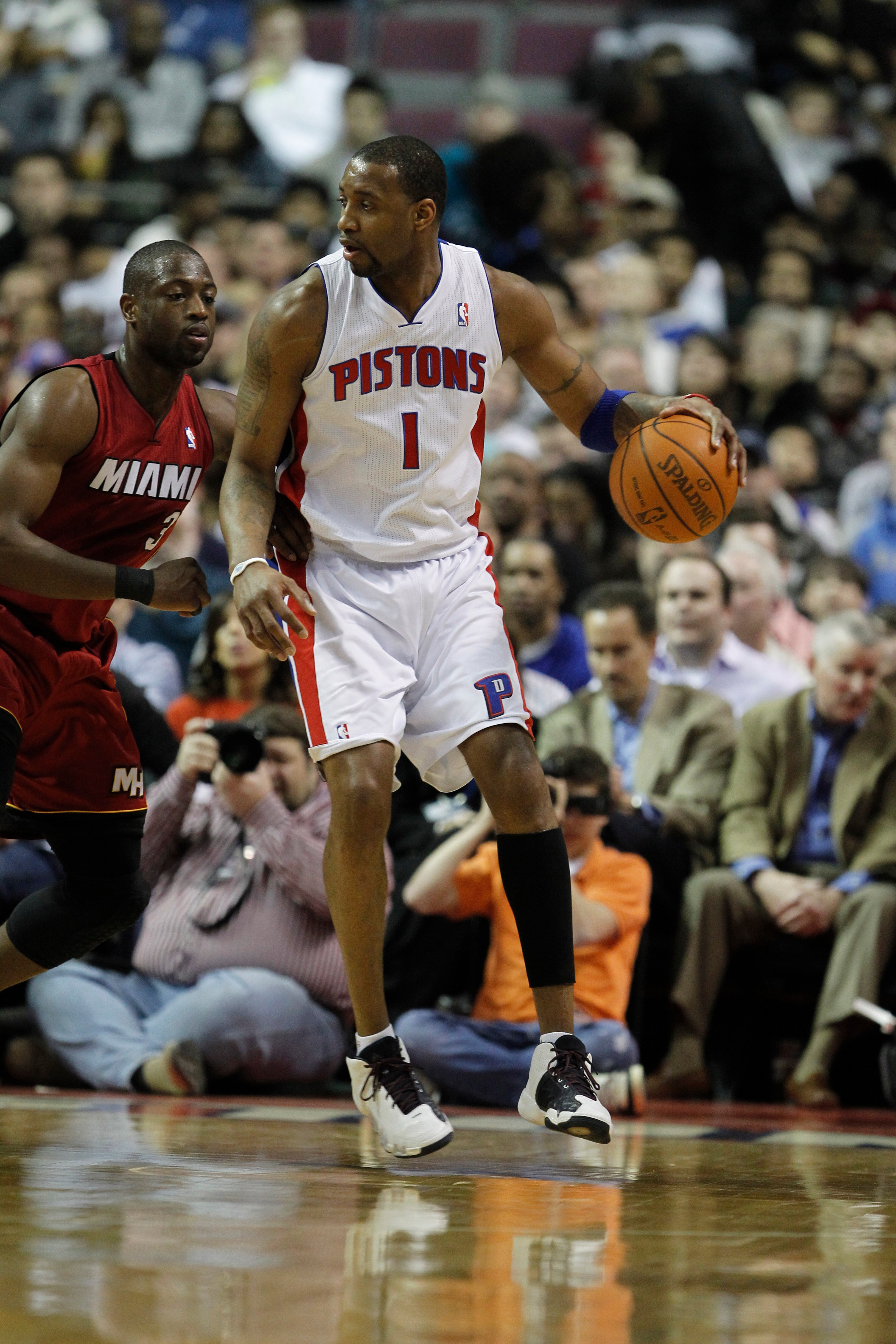 AUBURN HILLS, MI - FEBRUARY 11:  Tracy McGrady #1 of the Detroit Pistons controls the ball while playing the Miami Heat at The Palace of Auburn Hills on February 11, 2011 in Auburn Hills, Michigan.  (Photo by Gregory Shamus/Getty Images)