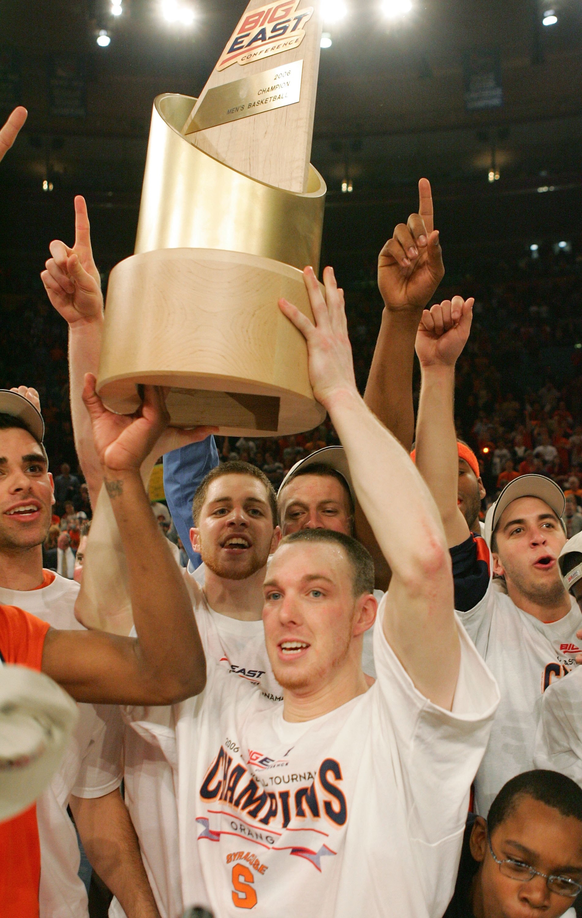 NEW YORK - MARCH 11:  Gerry McNamara #3 of the Syracuse Orange holds up the Big East tournament trophy after defeating the Pittsburgh Panthers 65-61 in the Big East Men's Basketball Championship Final at Madison Square Garden on March 11, 2006 in New York