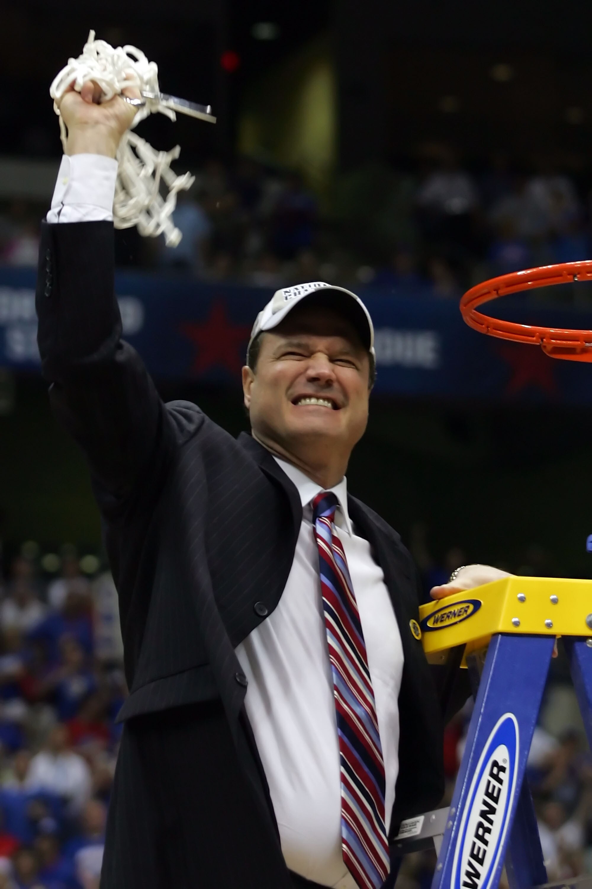 SAN ANTONIO - APRIL 07:  Head coach Bill Self of the Kansas Jayhawks celebrates by cutting down the nets after defeating the Memphis Tigers 75-68 in overtime during the 2008 NCAA Men's National Championship game at the Alamodome on April 7, 2008 in San An