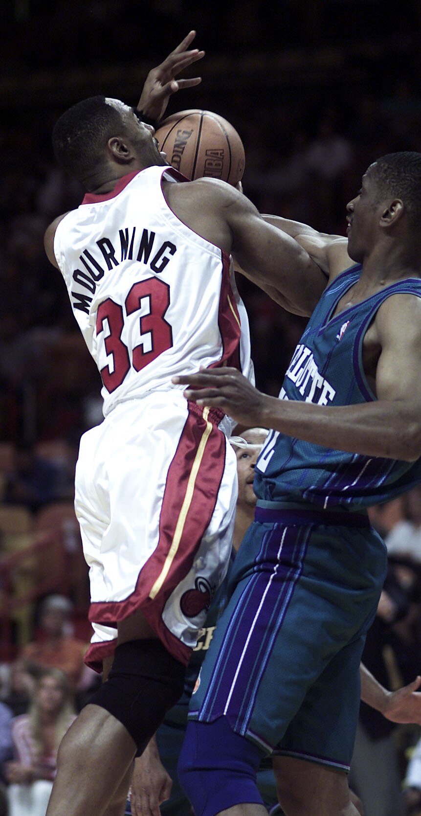 6 Apr 2001: Alonzo Mourning #33 of the Miami Heat tangles with Otis Thorpe #52 of the Charlotte Hornets in the first half at American Airlines Arena in Miami, Florida. DIGITAL IMAGE Mandatory Credit: Eliot Schechter/ALLSPORT  NOTE TO USER: It is expressly