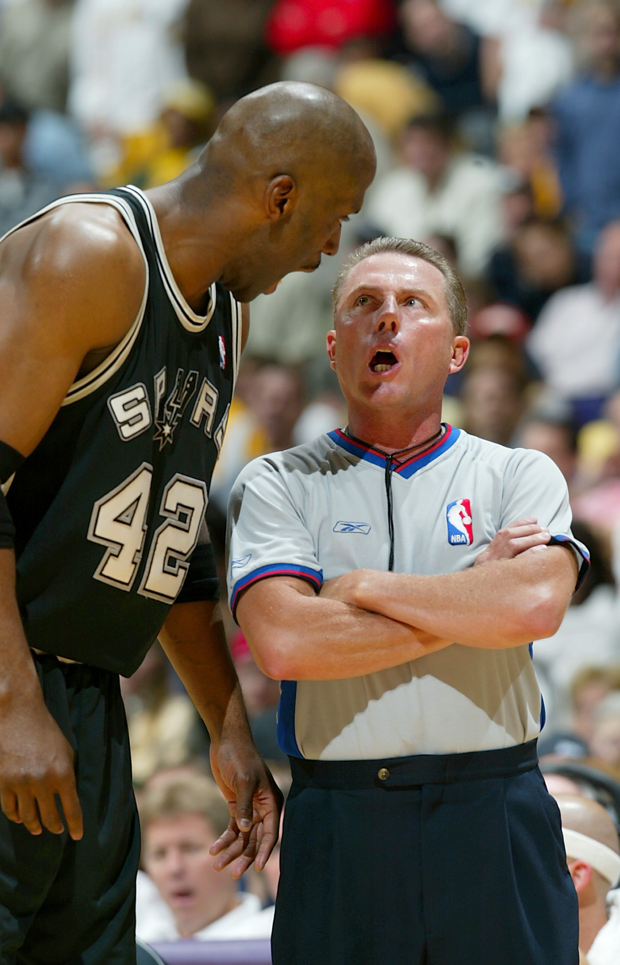 LOS ANGELES - APRIL 4:  Kevin Willis #42 of the San Antonio Spurs talks to referee Phil Robinson #70 during the game against the Los Angeles Lakers at Staples Center on April 4, 2004 in Los Angeles, California.  The Spurs won 95-89.  NOTE TO USER: User ex