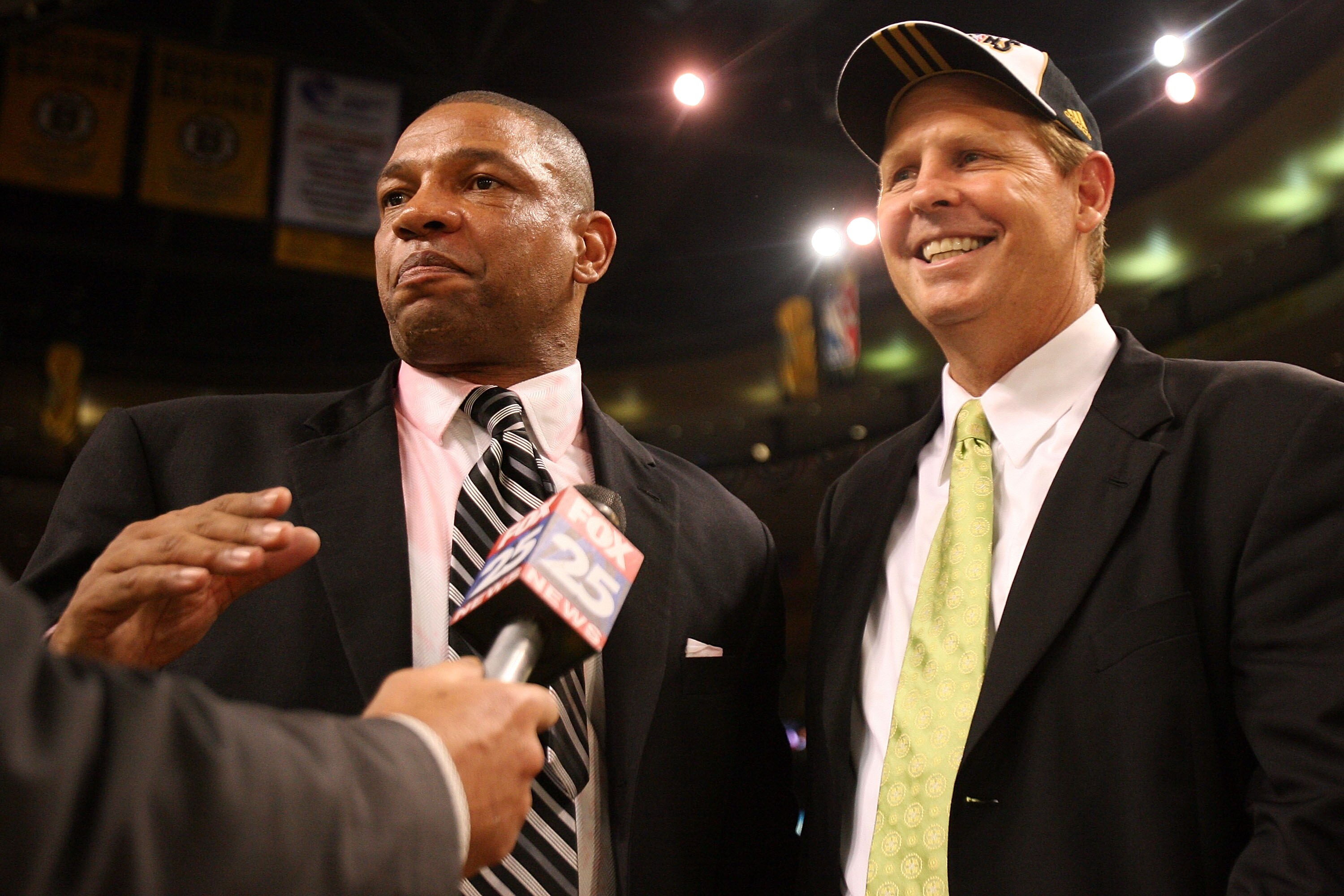 BOSTON - JUNE 17:  Head coach Doc Rivers and Executive Director of Basketball Operations Danny Ainge of the Boston Celtics celebrate after defeating the Los Angeles Lakers in Game Six of the 2008 NBA Finals on June 17, 2008 at TD Banknorth Garden in Bosto