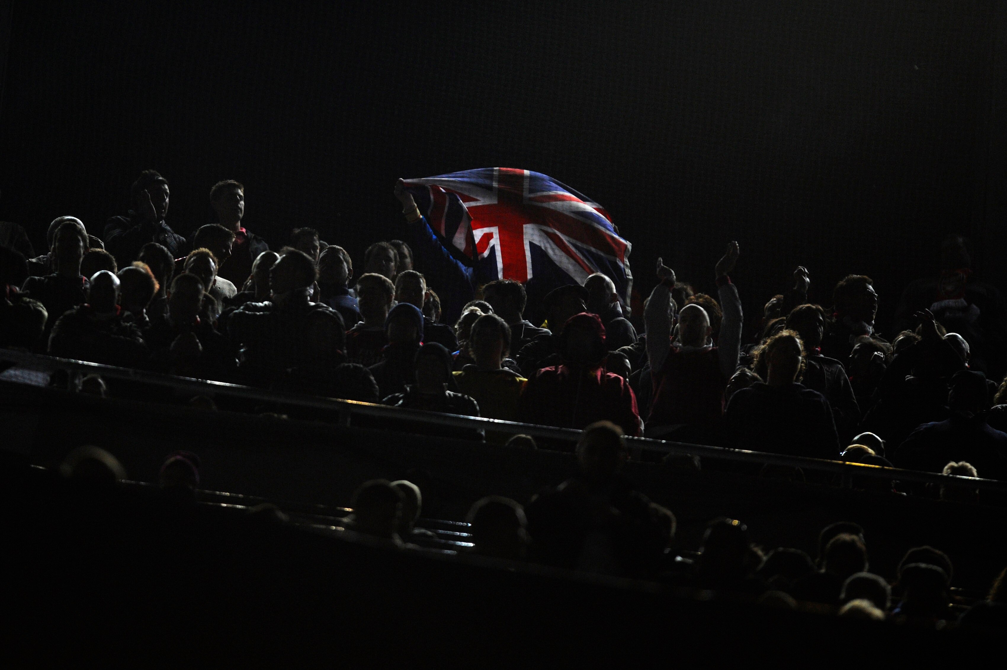 BARCELONA, SPAIN - MARCH 08:  An Arsenal supporter wave an Union Jack flag during the UEFA Champions League round of 16 second leg match between Barcelona and Arsenal at the Camp Nou stadium on March 8, 2011 in Barcelona, Spain.  Barcelona won 3-1.  (Phot