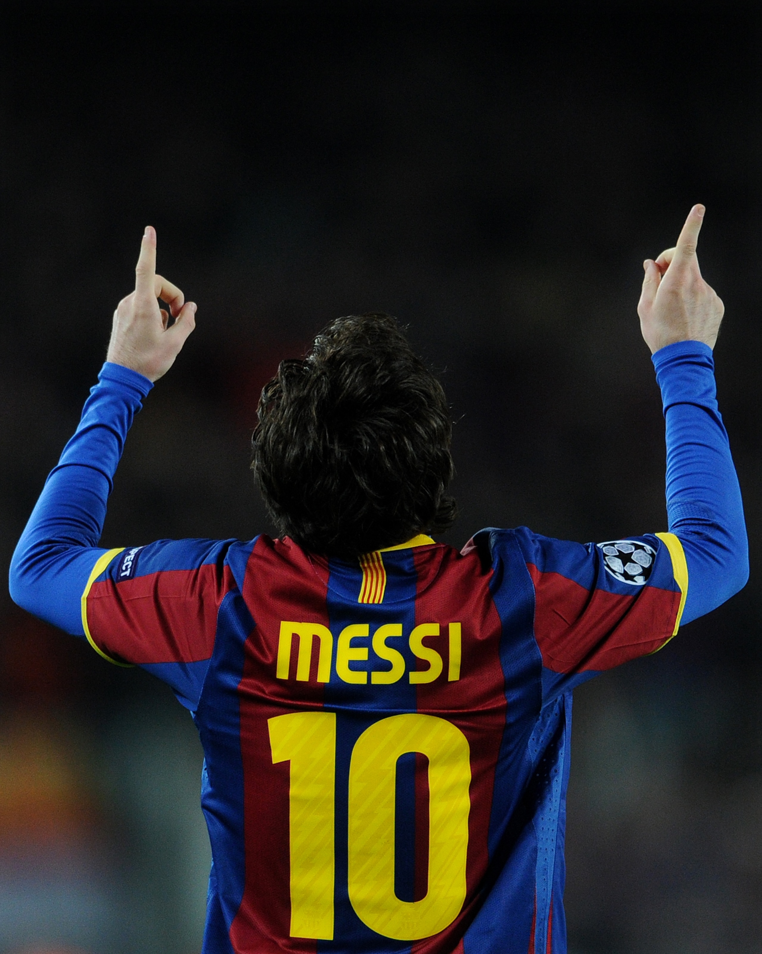BARCELONA, SPAIN - MARCH 08:  Lionel Messi of Barcelona reacts after scoring his sides opening goal during the UEFA Champions League round of 16 second leg match between Barcelona and Arsenal on March 8, 2011 in Barcelona, Spain.  (Photo by Jasper Juinen/